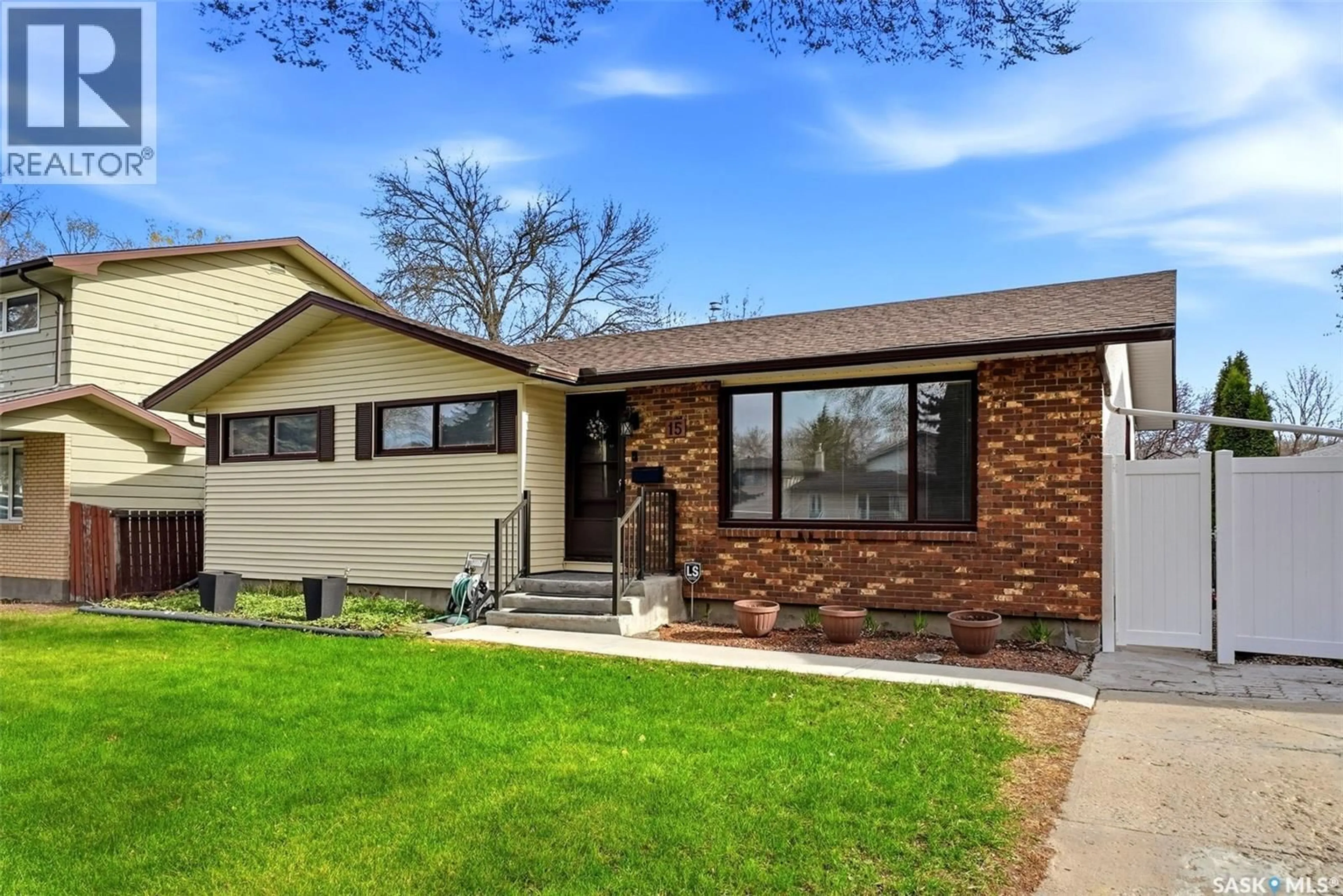 Home with brick exterior material, street for 15 HUDSON DRIVE, Regina Saskatchewan S4S2W1
