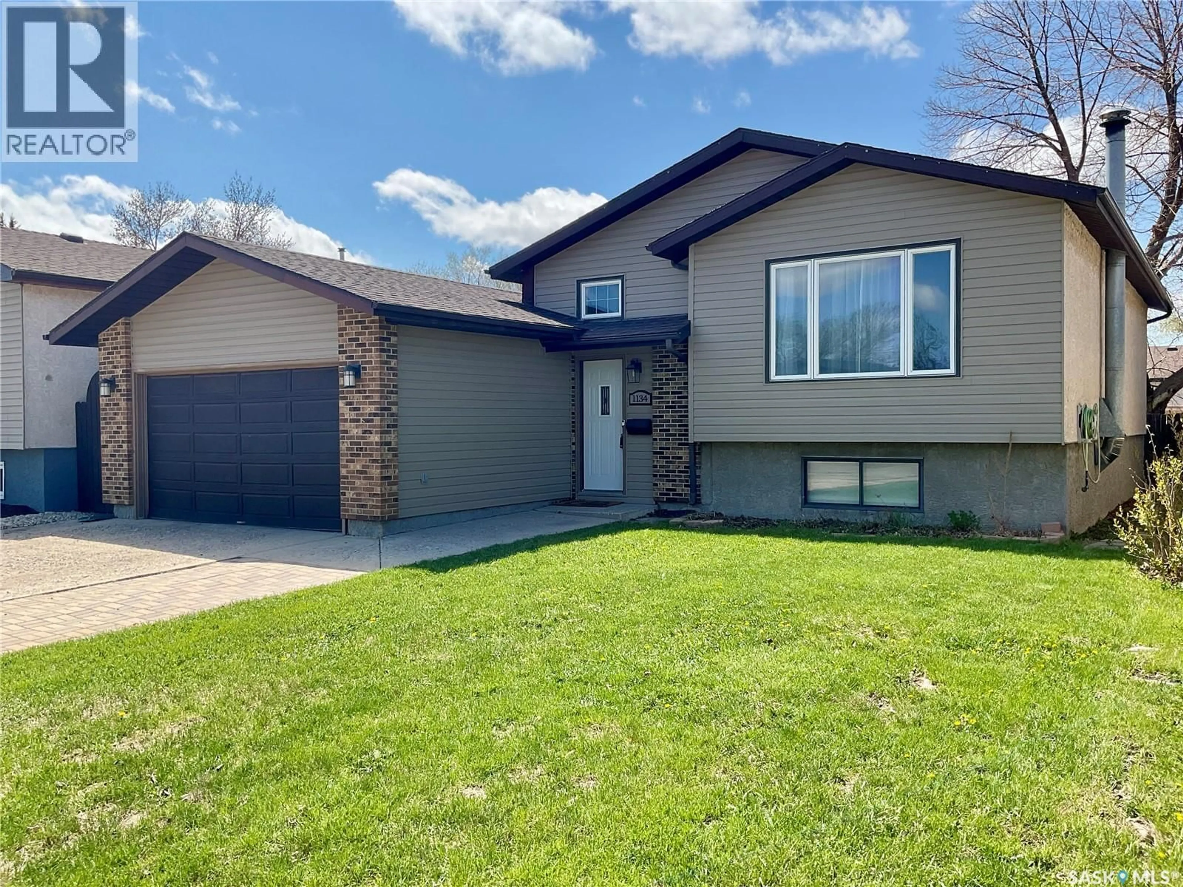 Home with vinyl exterior material, street for 1134 BROWN STREET, Regina Saskatchewan S4N6K6