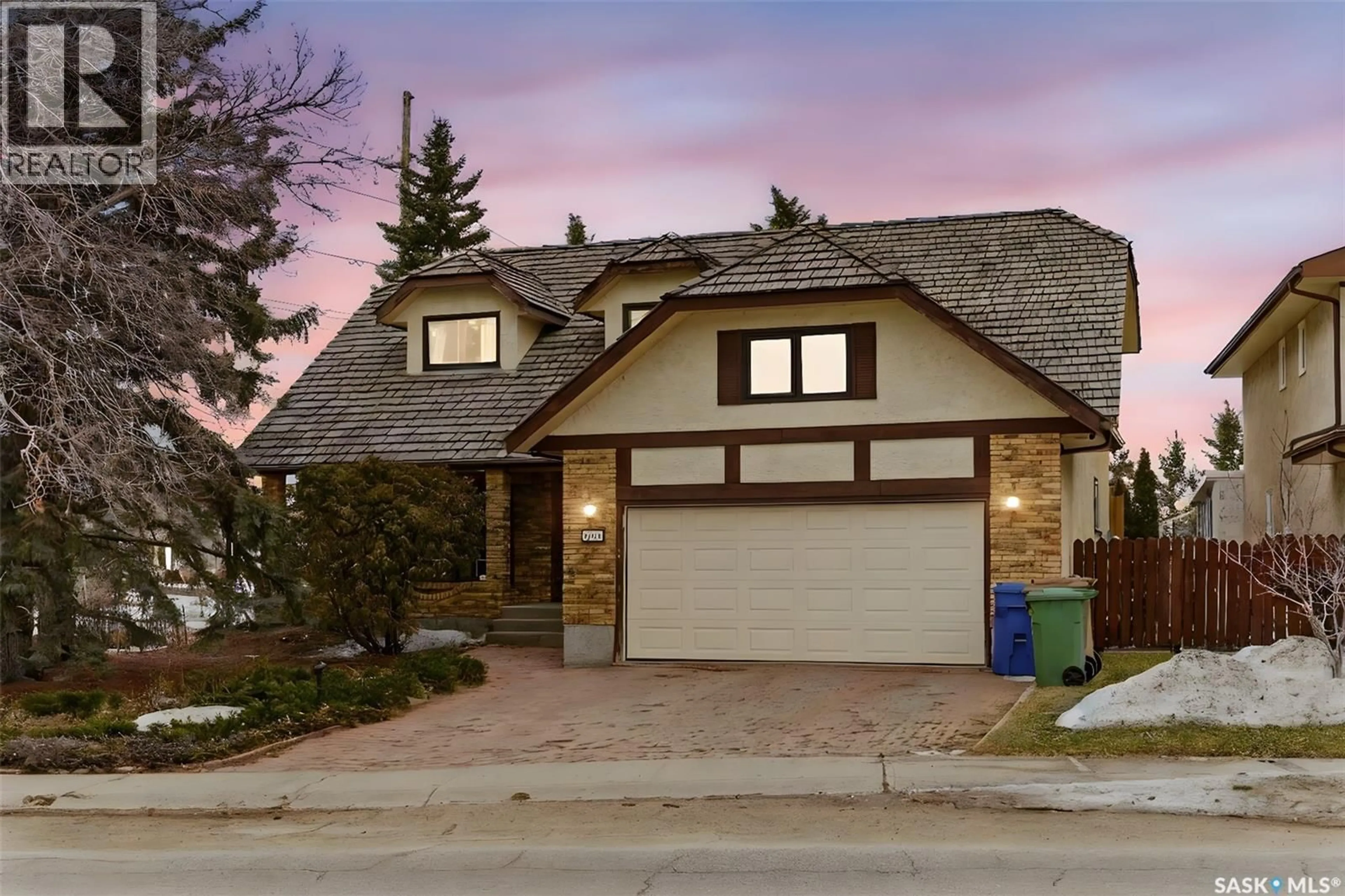 Home with brick exterior material, street for 2402 TRUESDALE DRIVE, Regina Saskatchewan S4V0W2