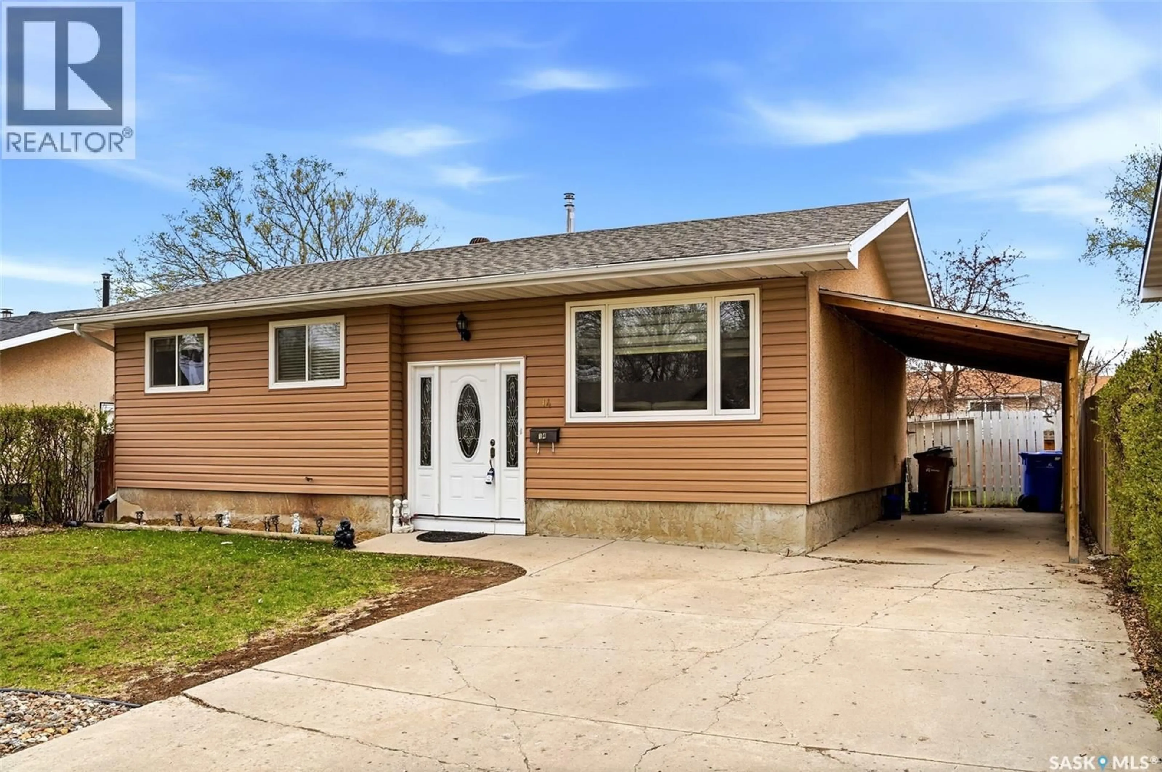 Home with vinyl exterior material, street for 14 DIAMOND STREET, Regina Saskatchewan S4N5K2