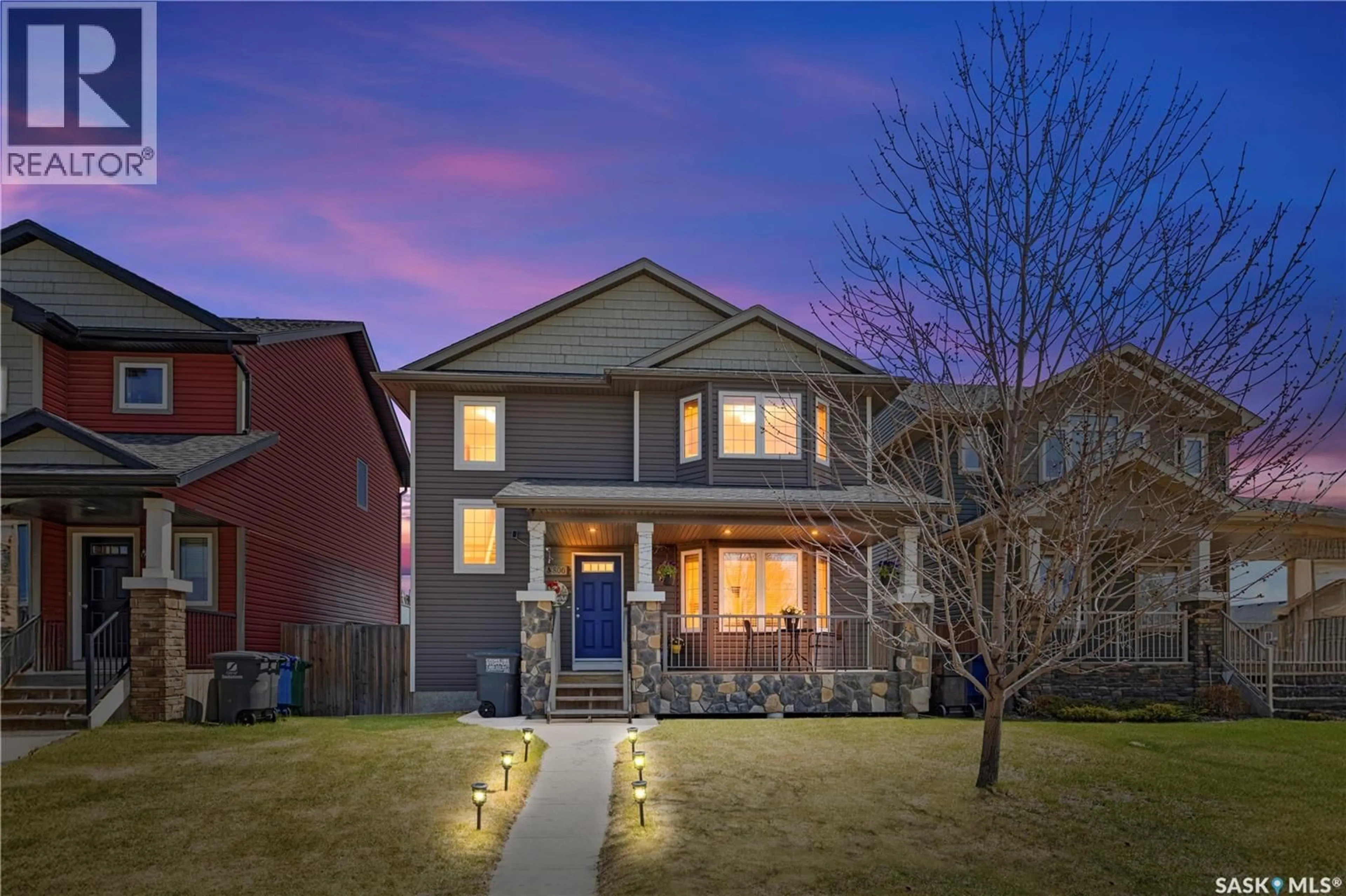 Home with brick exterior material, street for 806 STONEBRIDGE COMMON, Saskatoon Saskatchewan S7T0M8