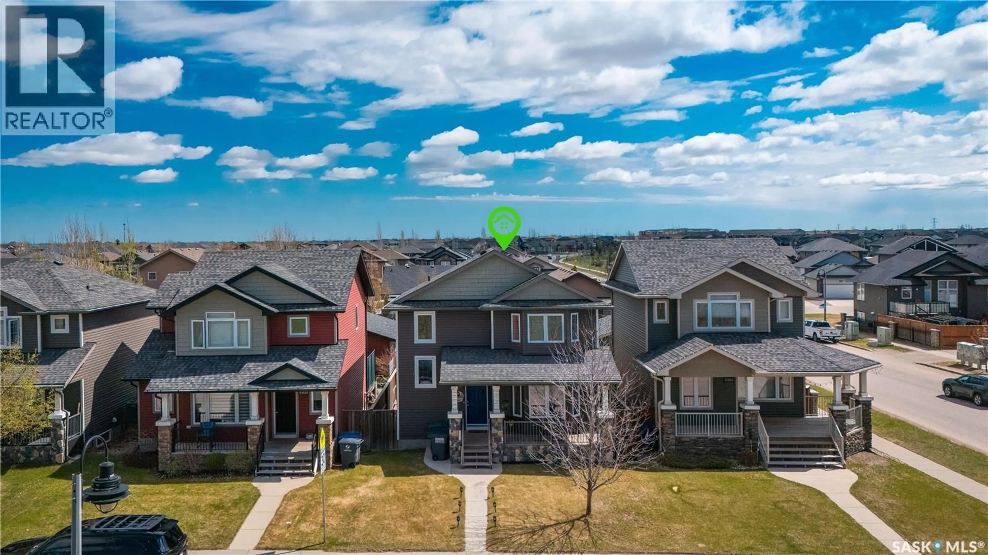 A pic from outside/outdoor area/front of a property/back of a property/a pic from drone, water/lake/river/ocean view for 806 STONEBRIDGE COMMON, Saskatoon Saskatchewan S7T0M8