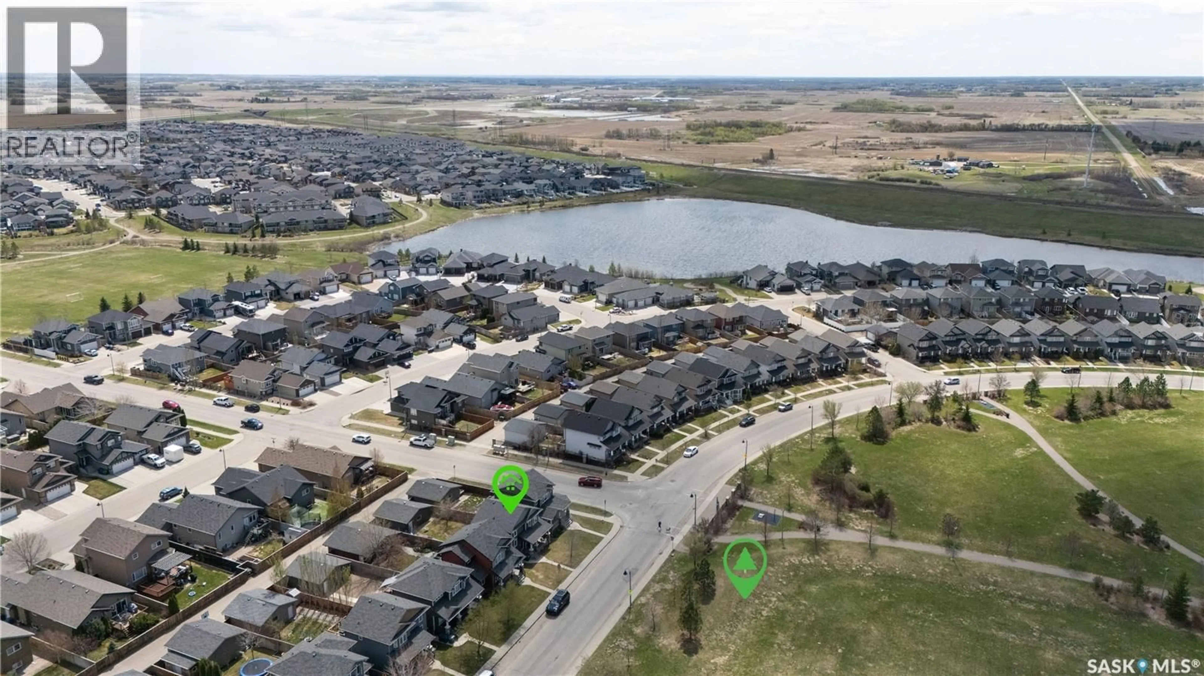 A pic from outside/outdoor area/front of a property/back of a property/a pic from drone, water/lake/river/ocean view for 806 STONEBRIDGE COMMON, Saskatoon Saskatchewan S7T0M8