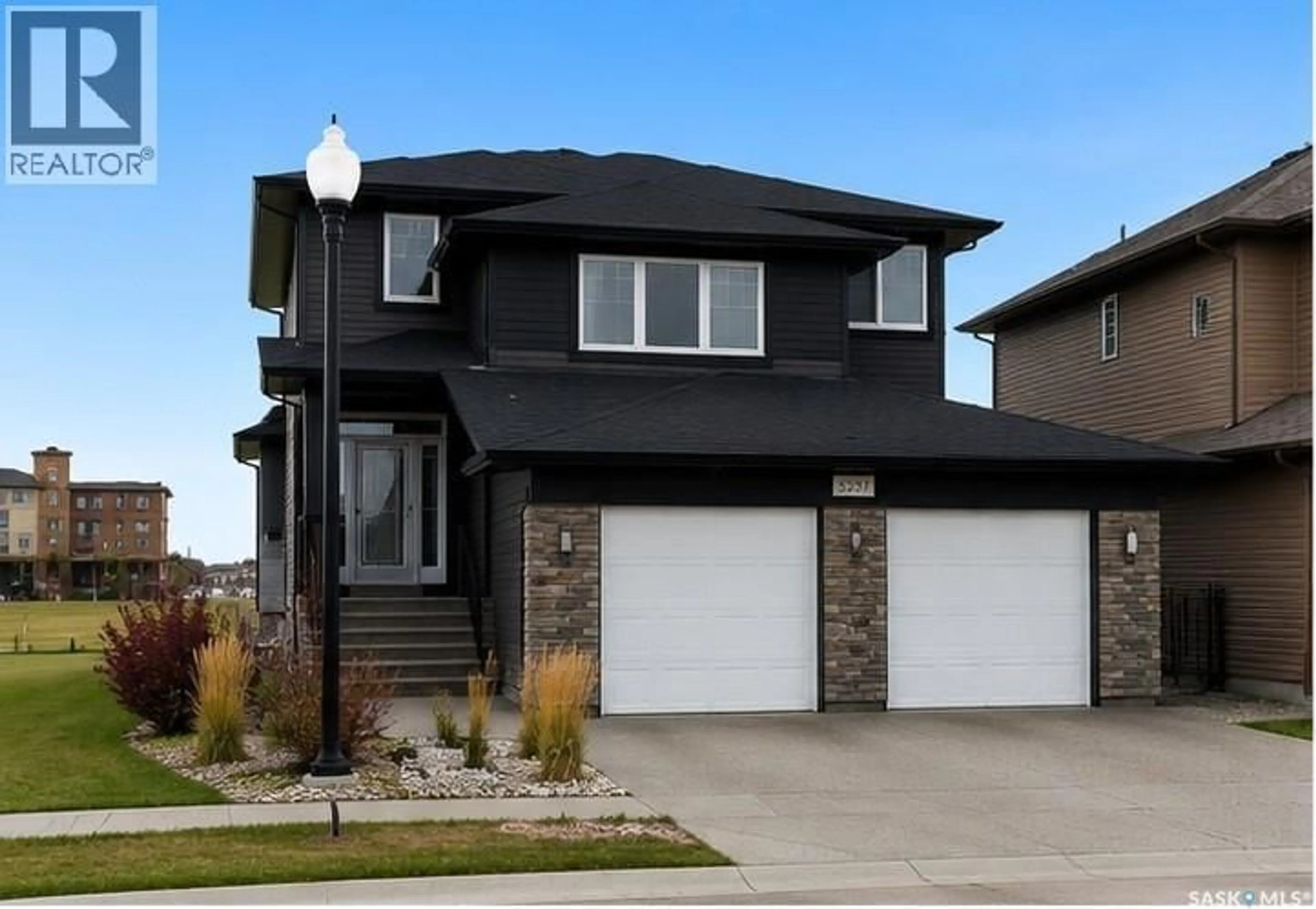 Home with vinyl exterior material, street for 5237 SNOWBIRDS CRESCENT, Regina Saskatchewan S4W0H4
