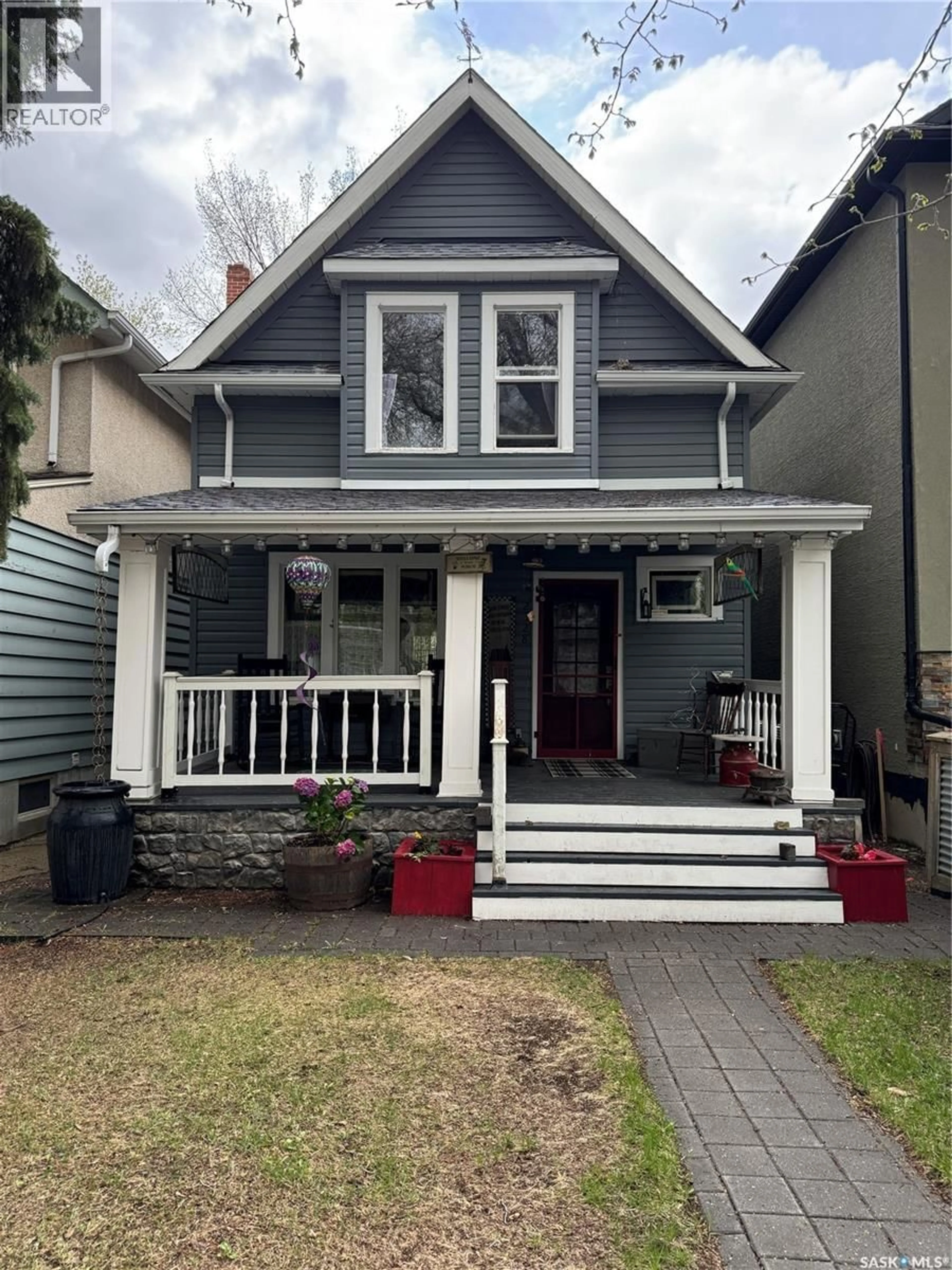 Home with vinyl exterior material, street for 2328 RAE STREET, Regina Saskatchewan S4T2G2