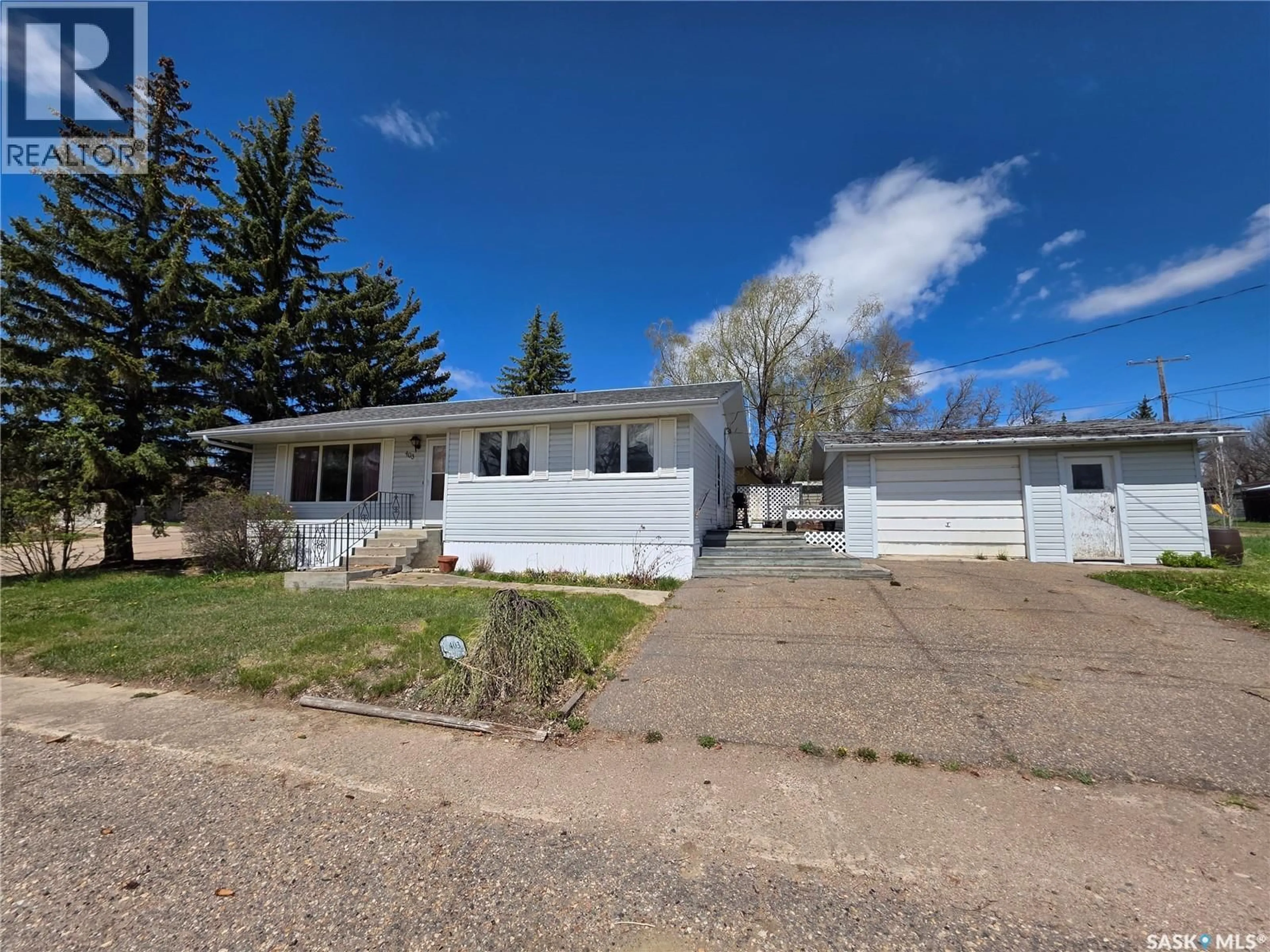 Home with vinyl exterior material, street for 403 ANNABLE STREET, Herbert Saskatchewan S0H2A0