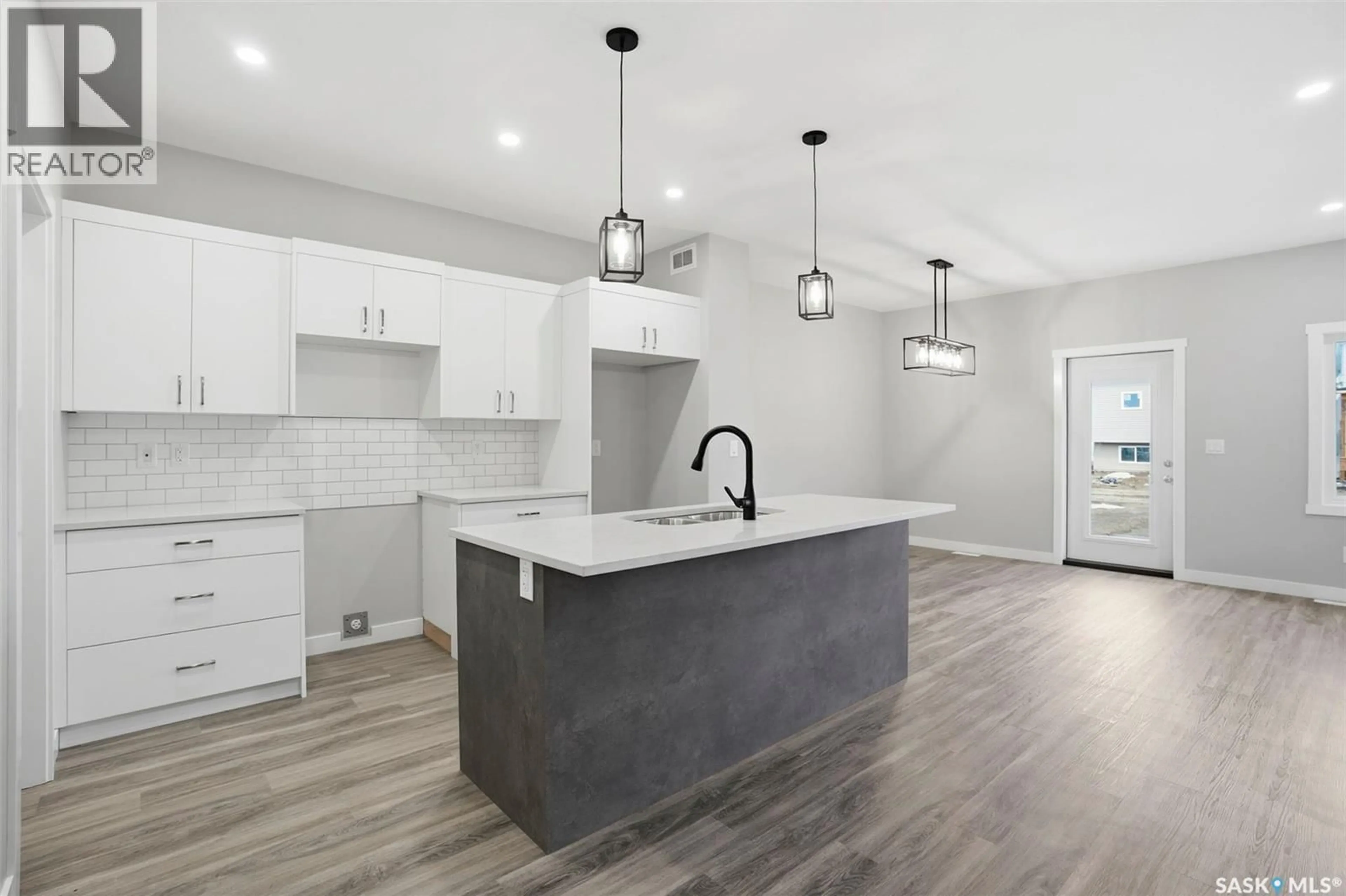 Open concept kitchen, ceramic/tile floor for 815 BRIGHTON BOULEVARD, Saskatoon Saskatchewan S7V0Y4