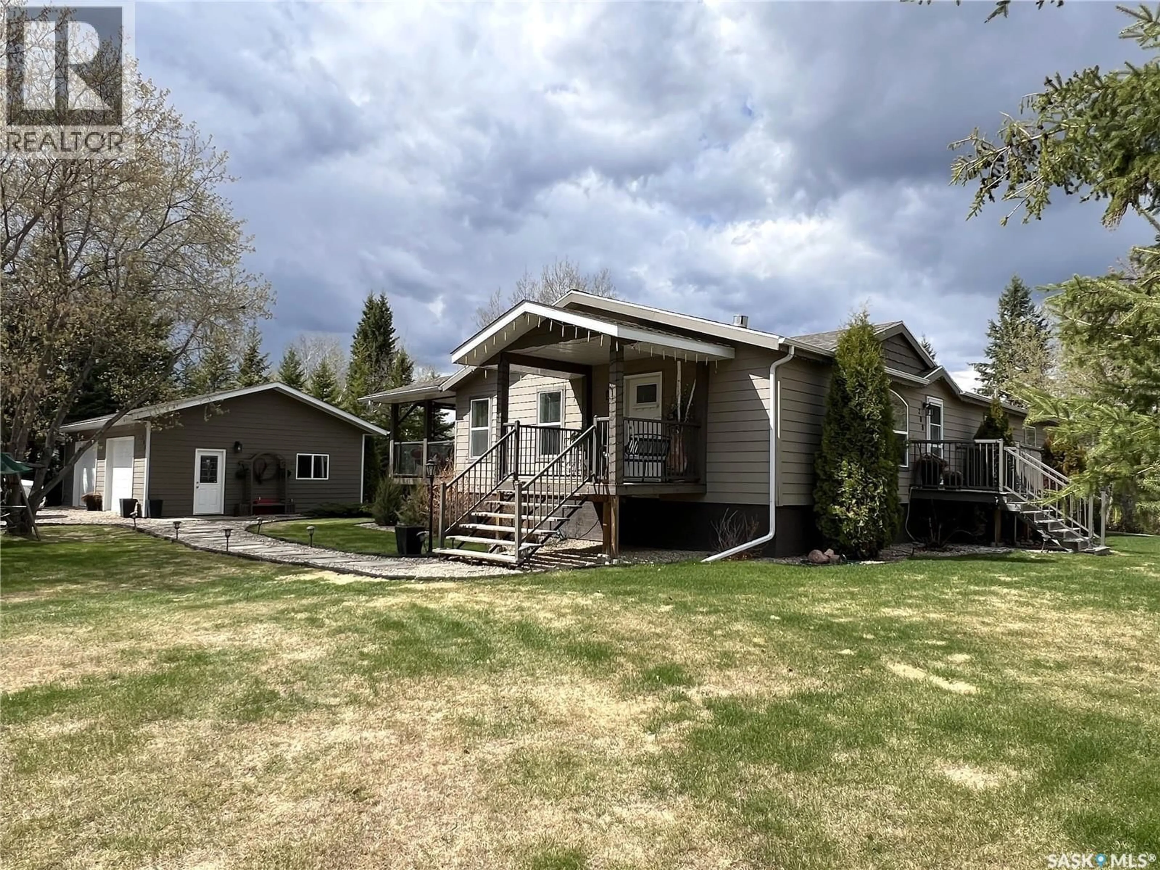 A pic from outside/outdoor area/front of a property/back of a property/a pic from drone, unknown for 208 2ND AVENUE, Dorintosh Saskatchewan S0M0T0