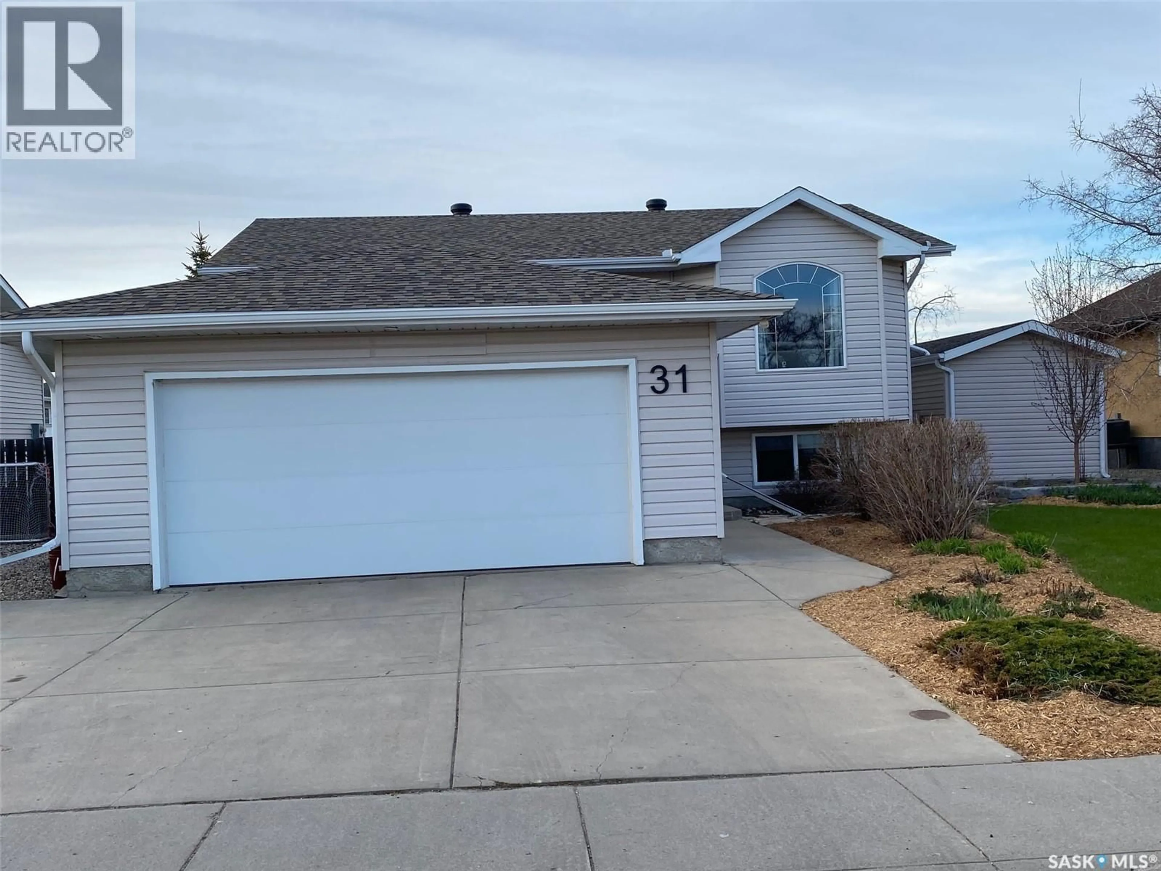 Home with vinyl exterior material, street for 31 ROSS DRIVE, Yorkton Saskatchewan S3N4A2