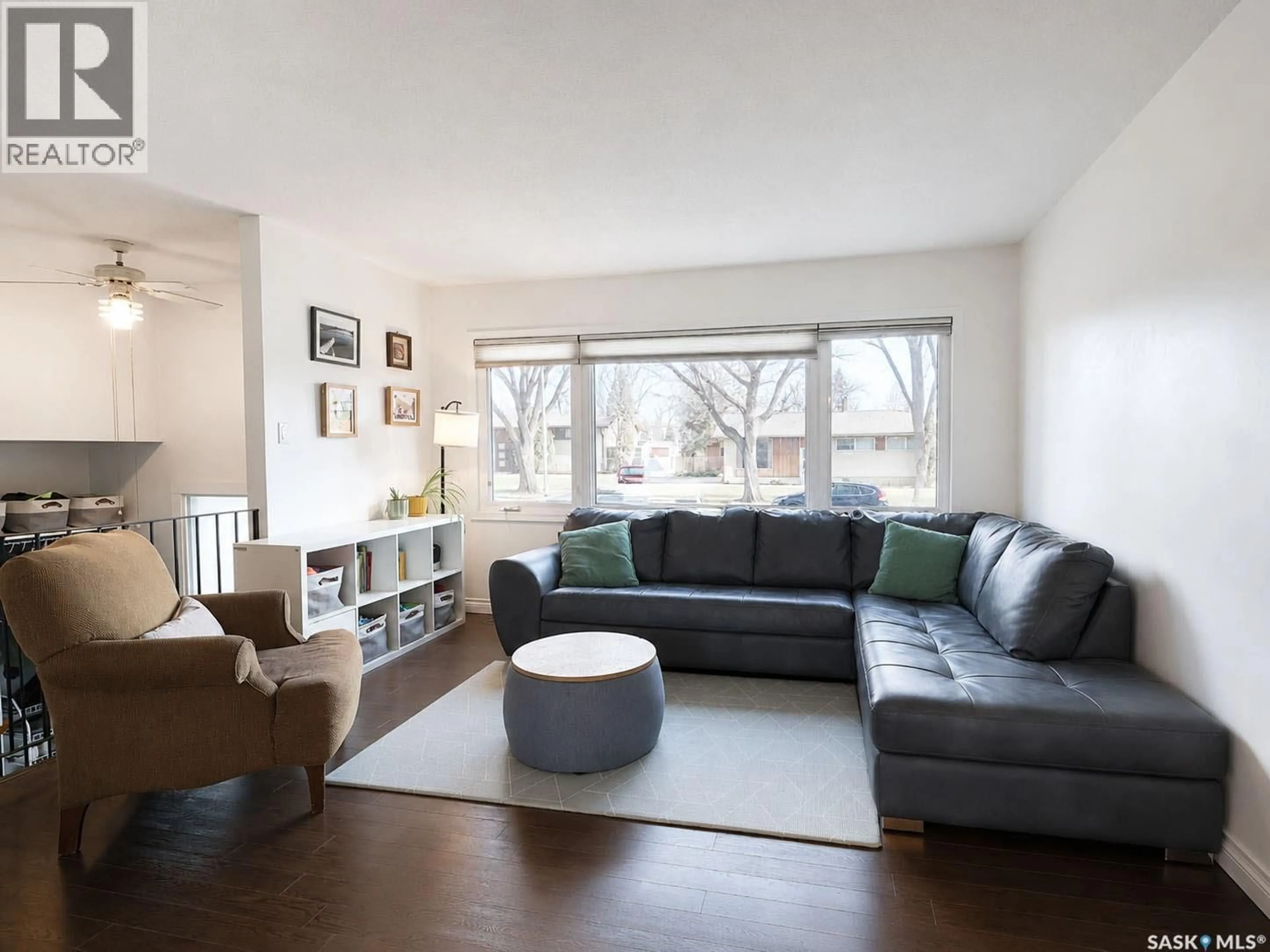 Living room with furniture, wood/laminate floor for 680 EASTWOOD STREET, Prince Albert Saskatchewan S6V2T5