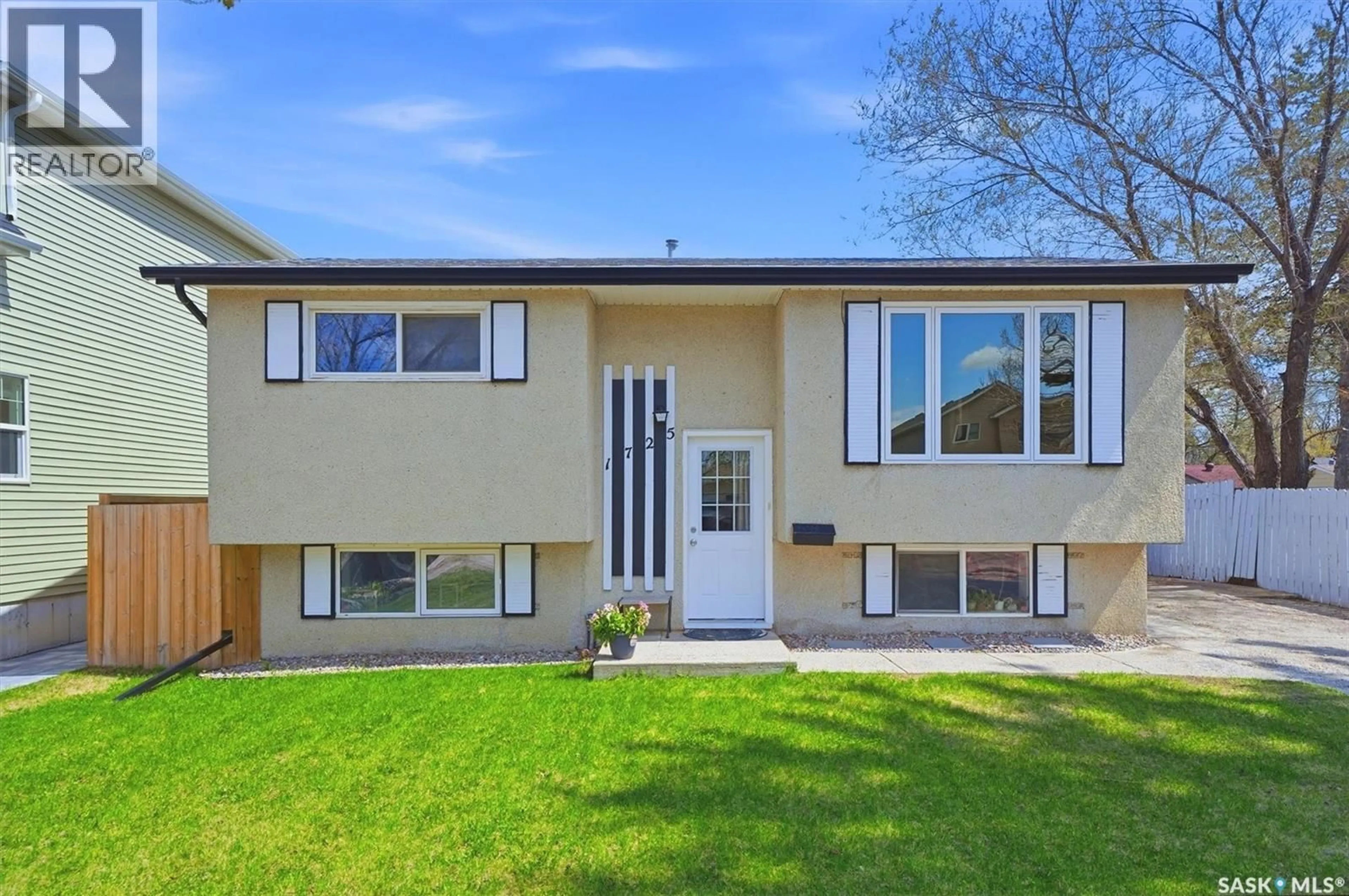 Home with vinyl exterior material, street for 1725 BELFAST AVENUE, Saskatoon Saskatchewan S7M0L6