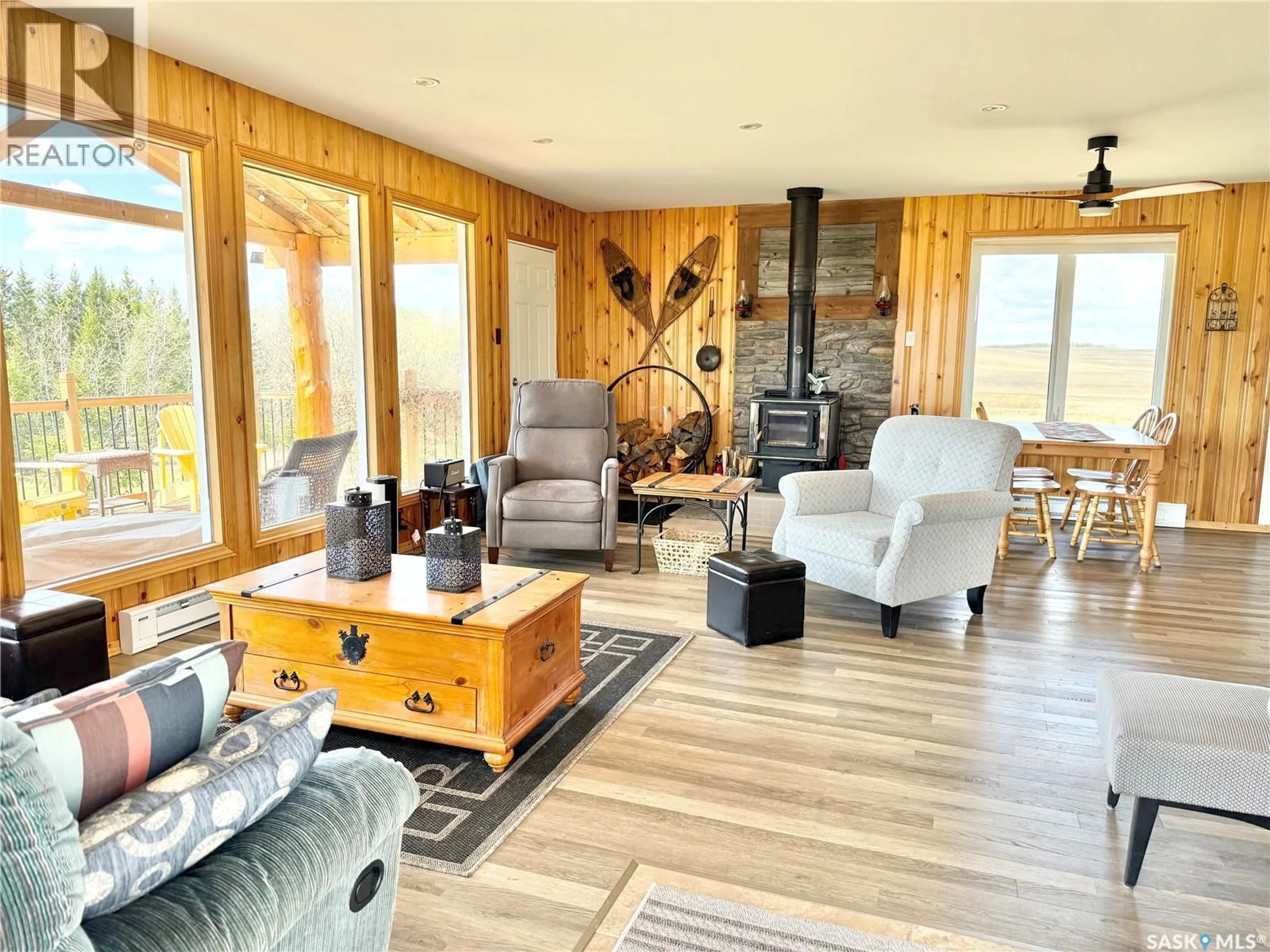 Living room with furniture, wood/laminate floor for Lot A WESTHILL RD, Pebble Baye Saskatchewan S0J2G0
