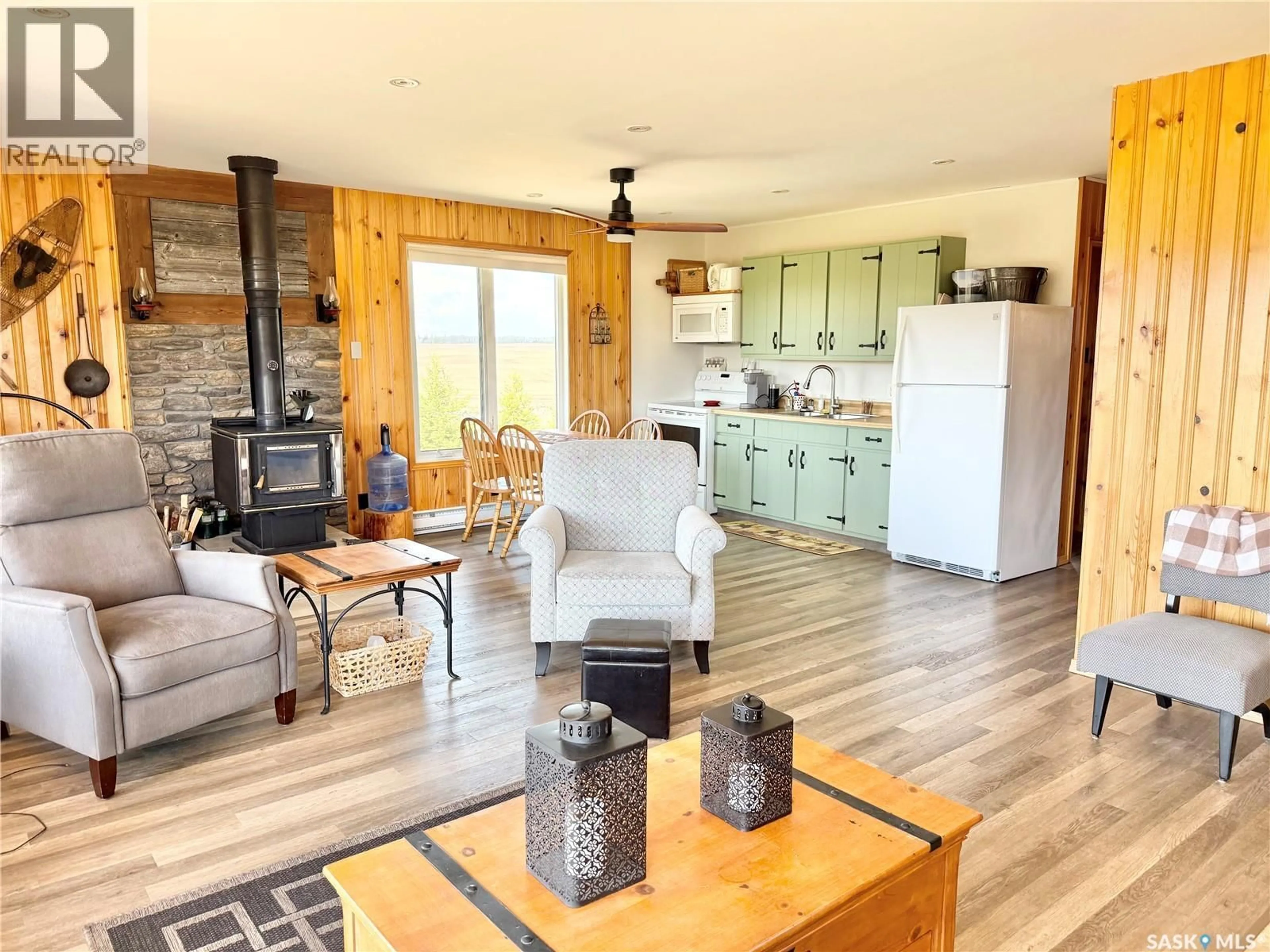 Living room with furniture, wood/laminate floor for Lot A WESTHILL RD, Pebble Baye Saskatchewan S0J2G0