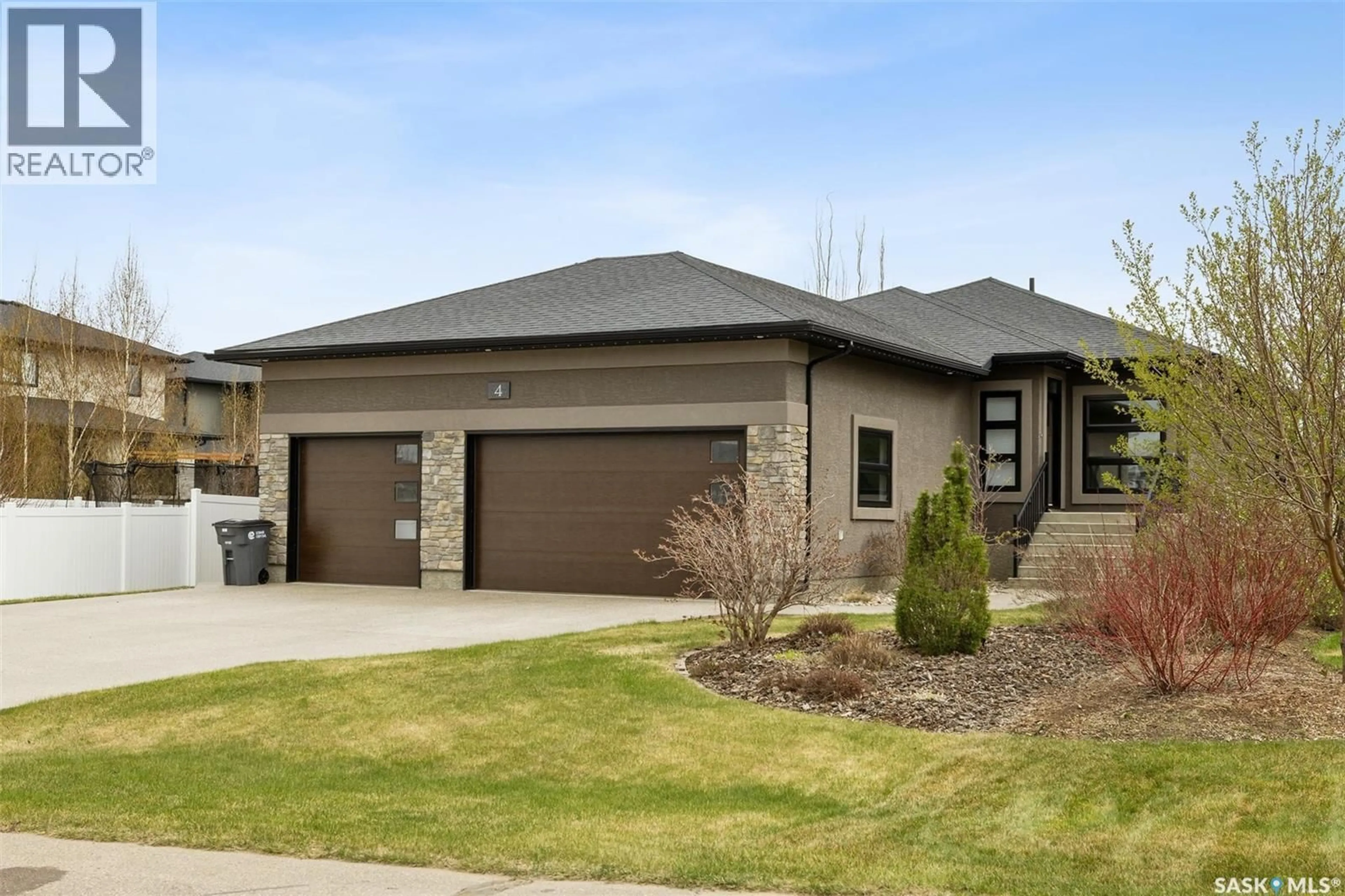 Home with brick exterior material, street for 4 COLLEGE CRESCENT, White City Saskatchewan S4L0C6