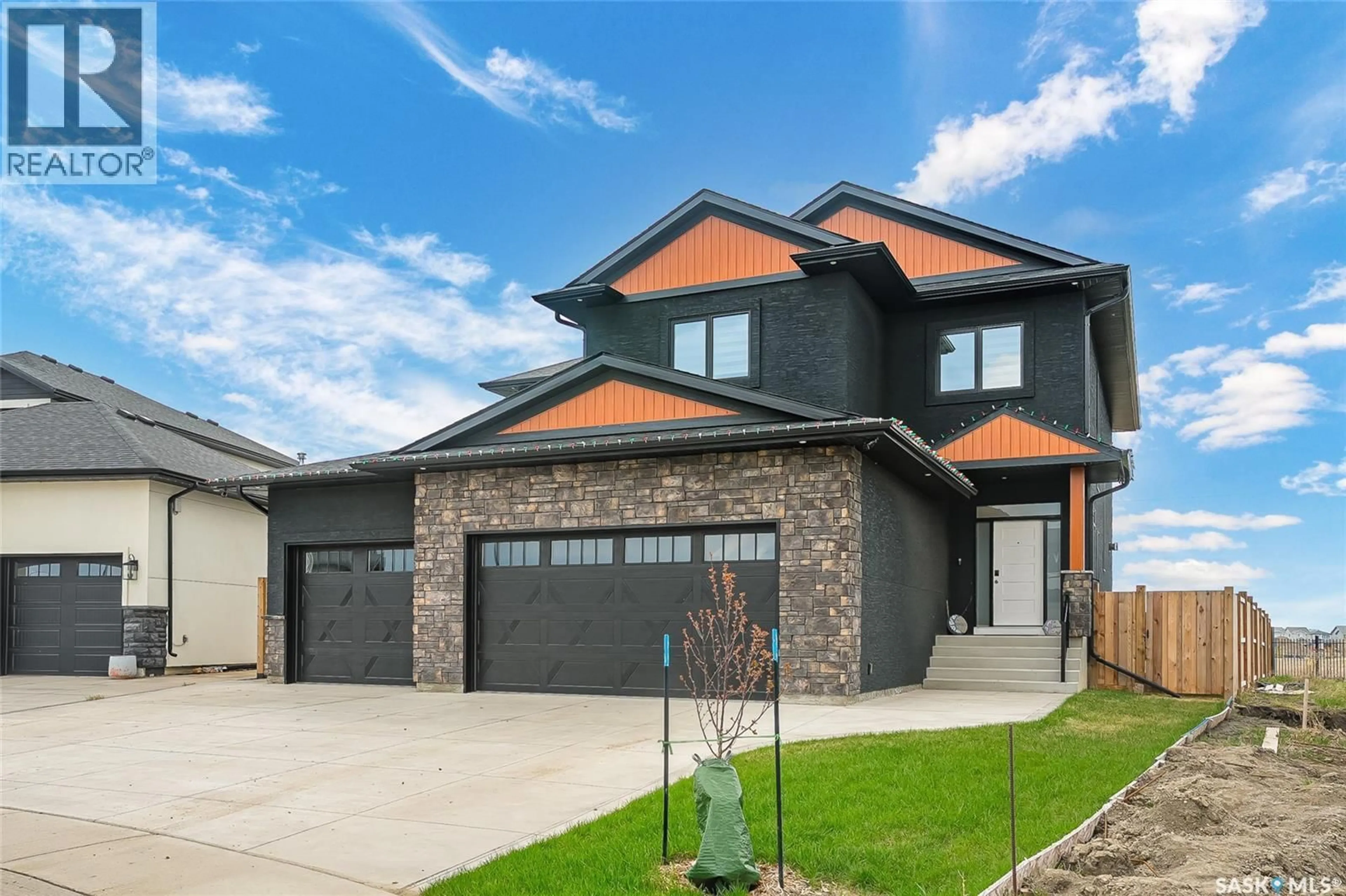 Home with brick exterior material, street for 862 BENTLEY MANOR, Saskatoon Saskatchewan S7L6P4