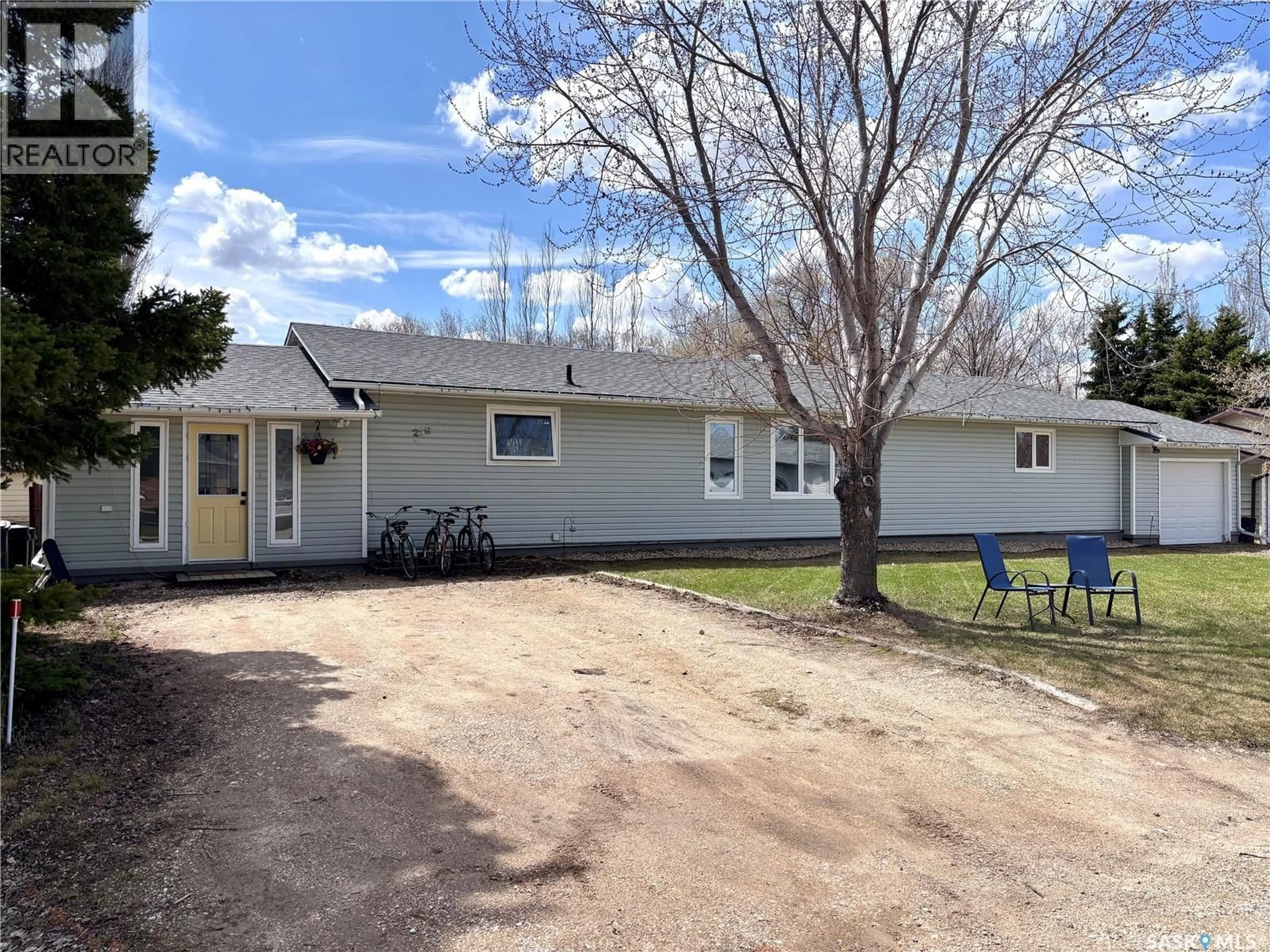 A pic from outside/outdoor area/front of a property/back of a property/a pic from drone, street for 218 TAPHORN STREET, Muenster Saskatchewan S0K2Y0