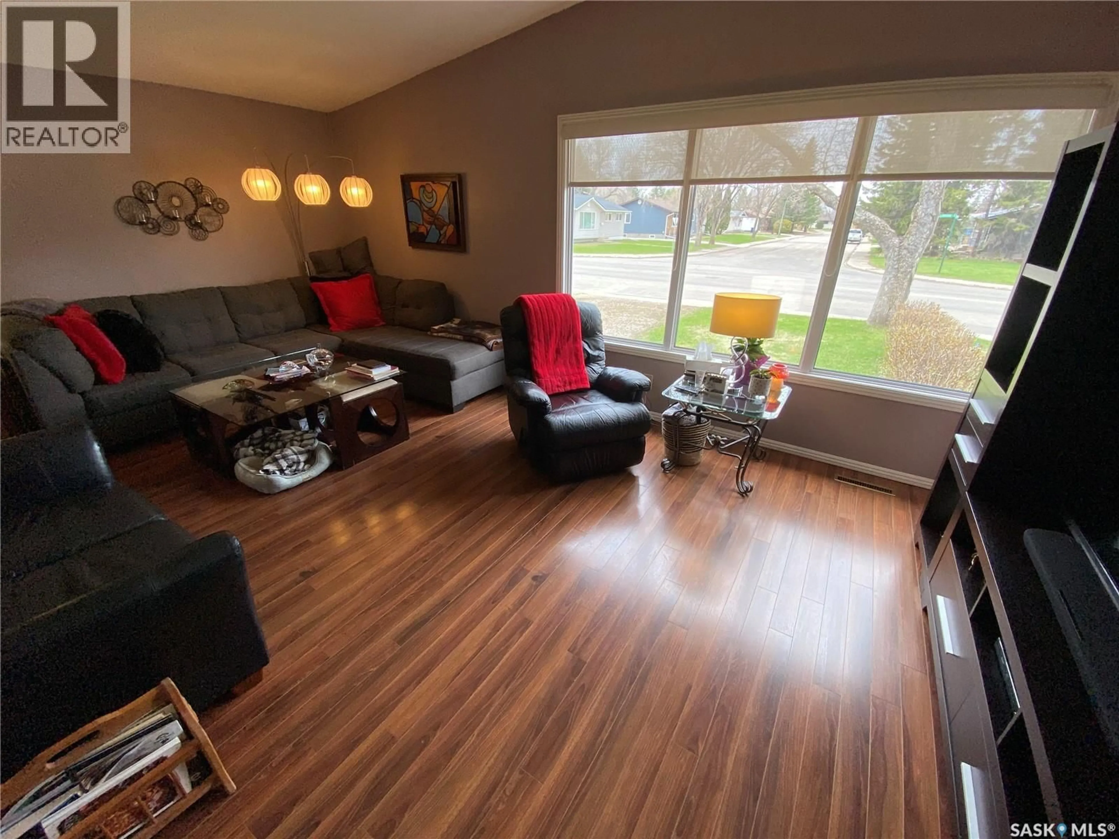 Living room with furniture, wood/laminate floor for 2 CIRCLEBROOKE DRIVE, Yorkton Saskatchewan S3N2T4
