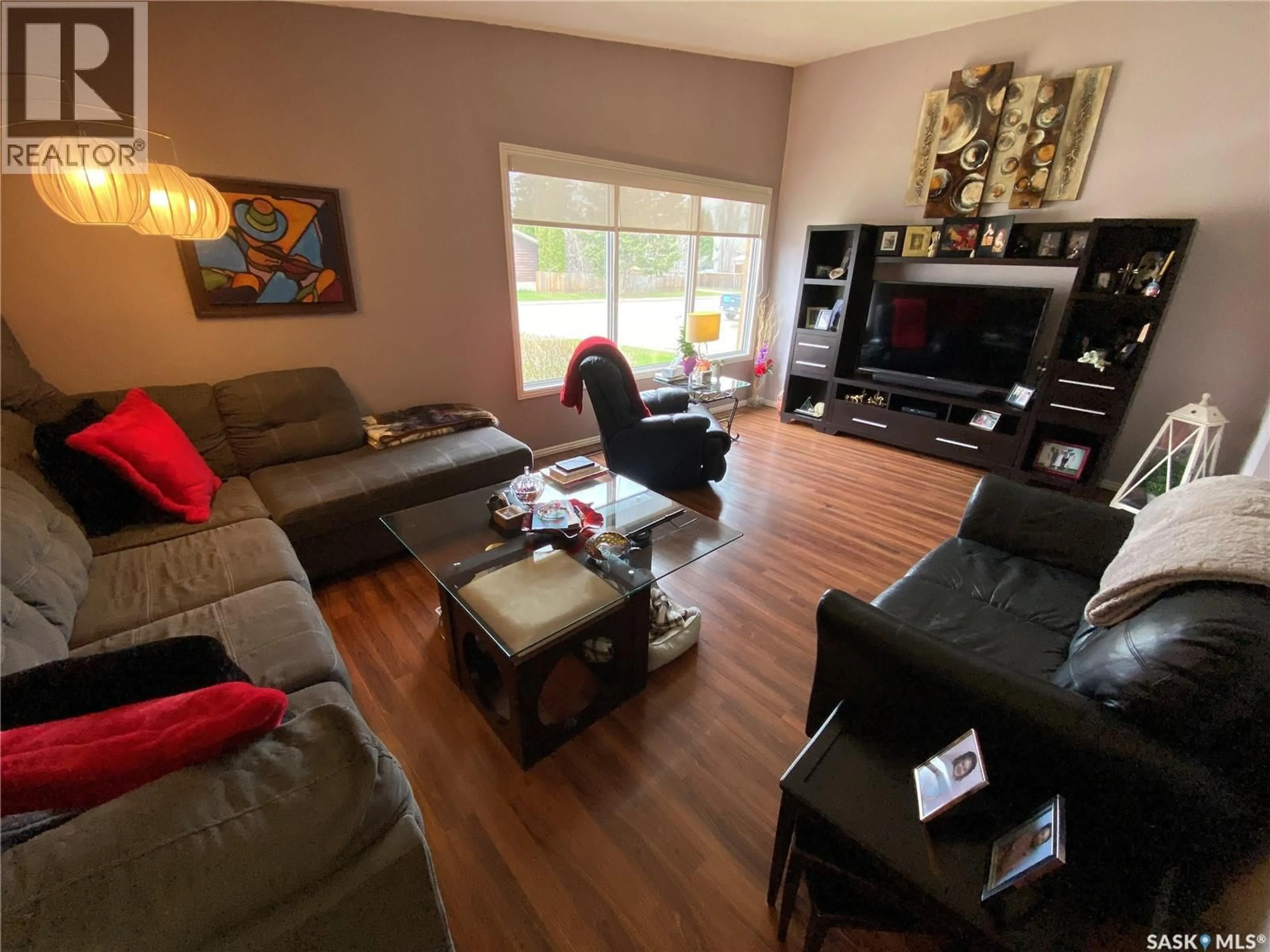Living room with furniture, wood/laminate floor for 2 CIRCLEBROOKE DRIVE, Yorkton Saskatchewan S3N2T4