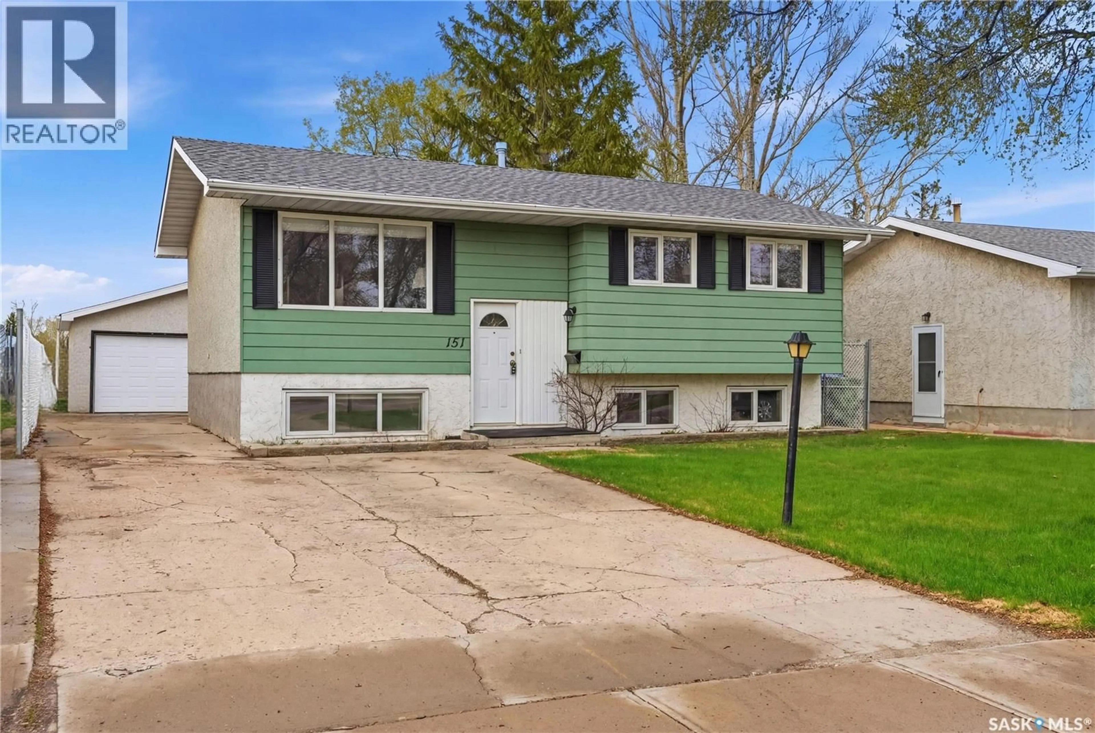 Home with vinyl exterior material, street for 151 MARKWELL DRIVE, Regina Saskatchewan S4X1K2