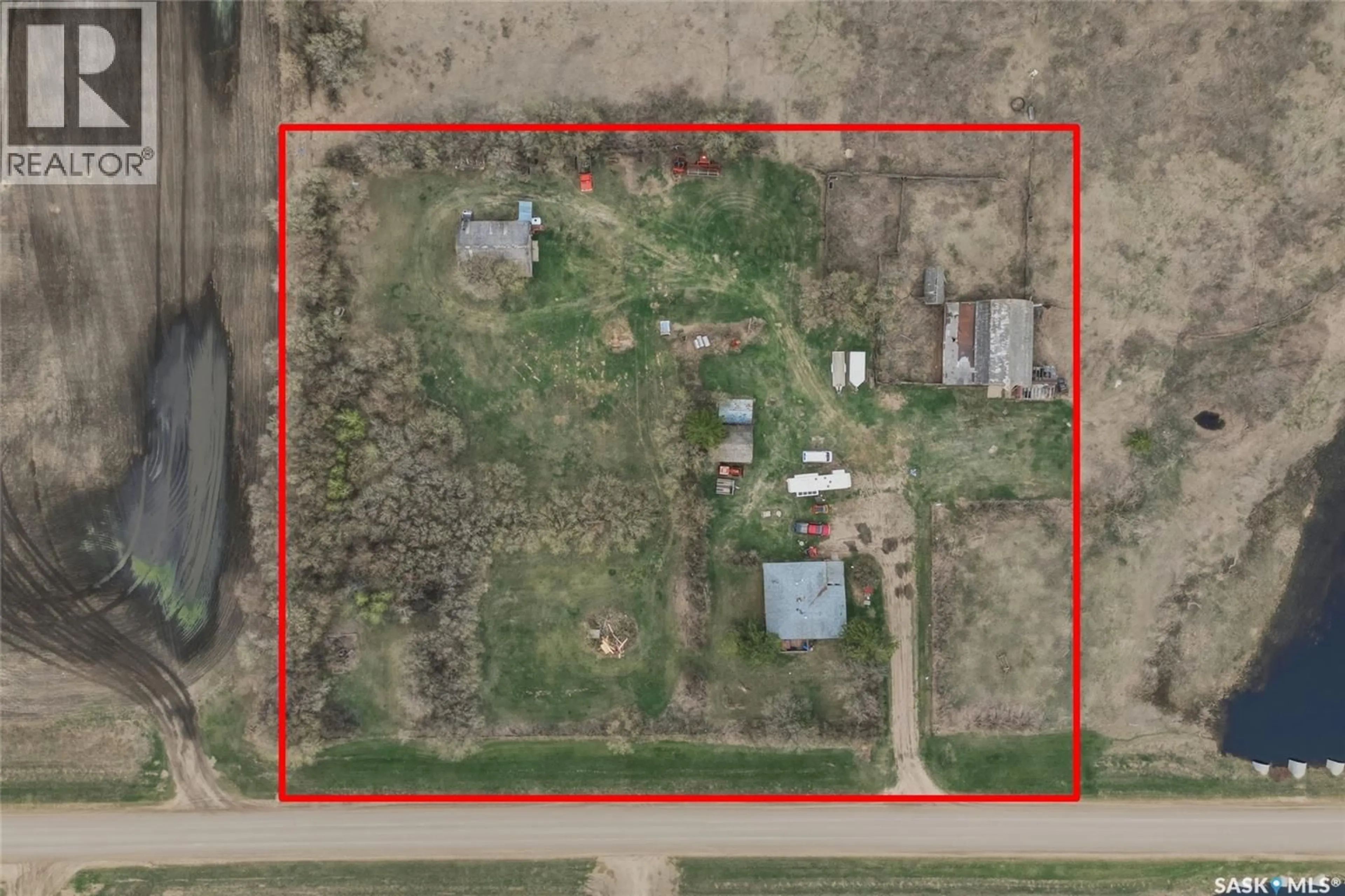A pic from outside/outdoor area/front of a property/back of a property/a pic from drone, building for HAGEL ACREAGE, Rosthern Rm No. 403 Saskatchewan S0K4O3
