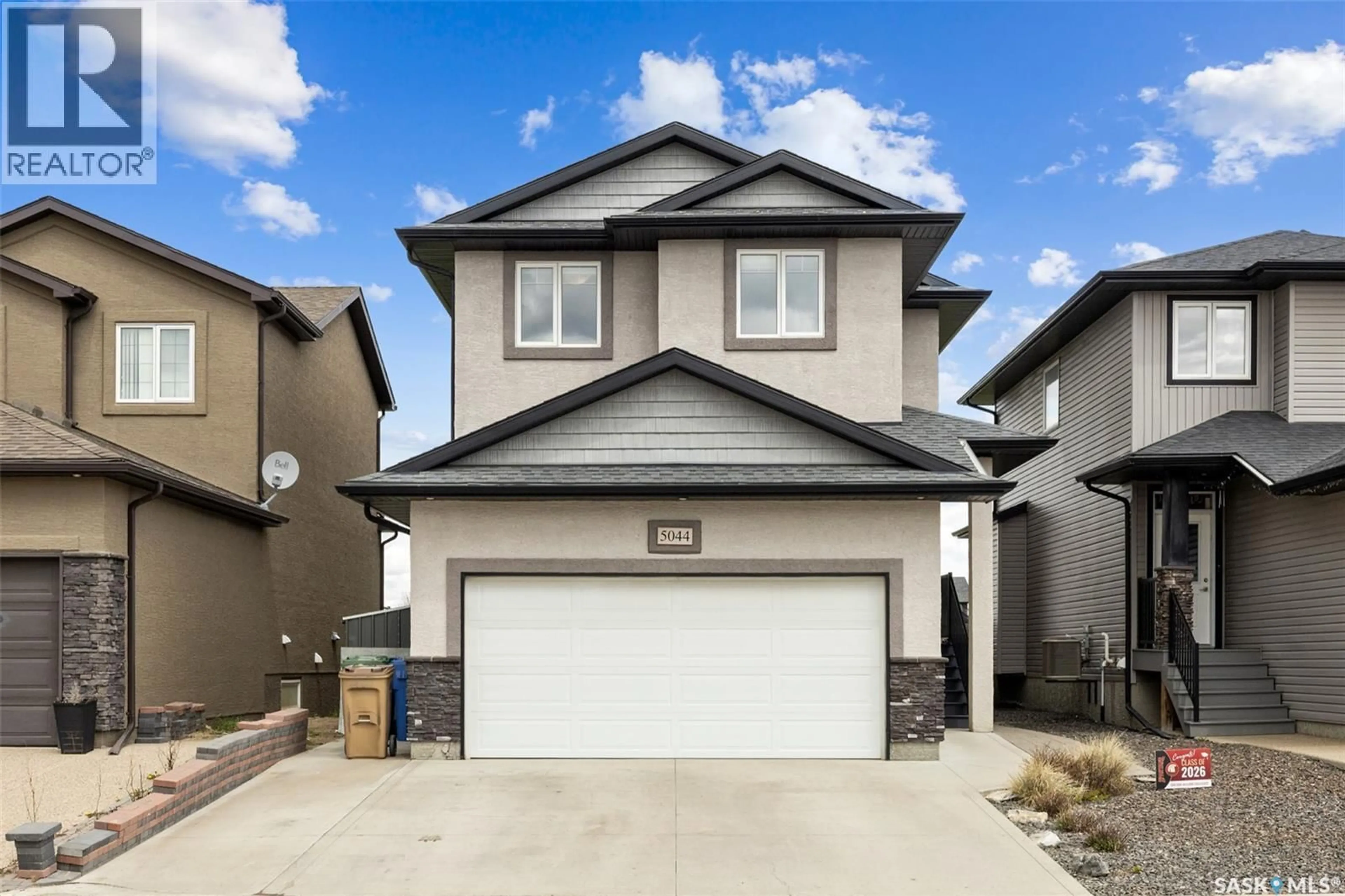 Home with vinyl exterior material, street for 5044 CRANE CRESCENT, Regina Saskatchewan S4W0B9
