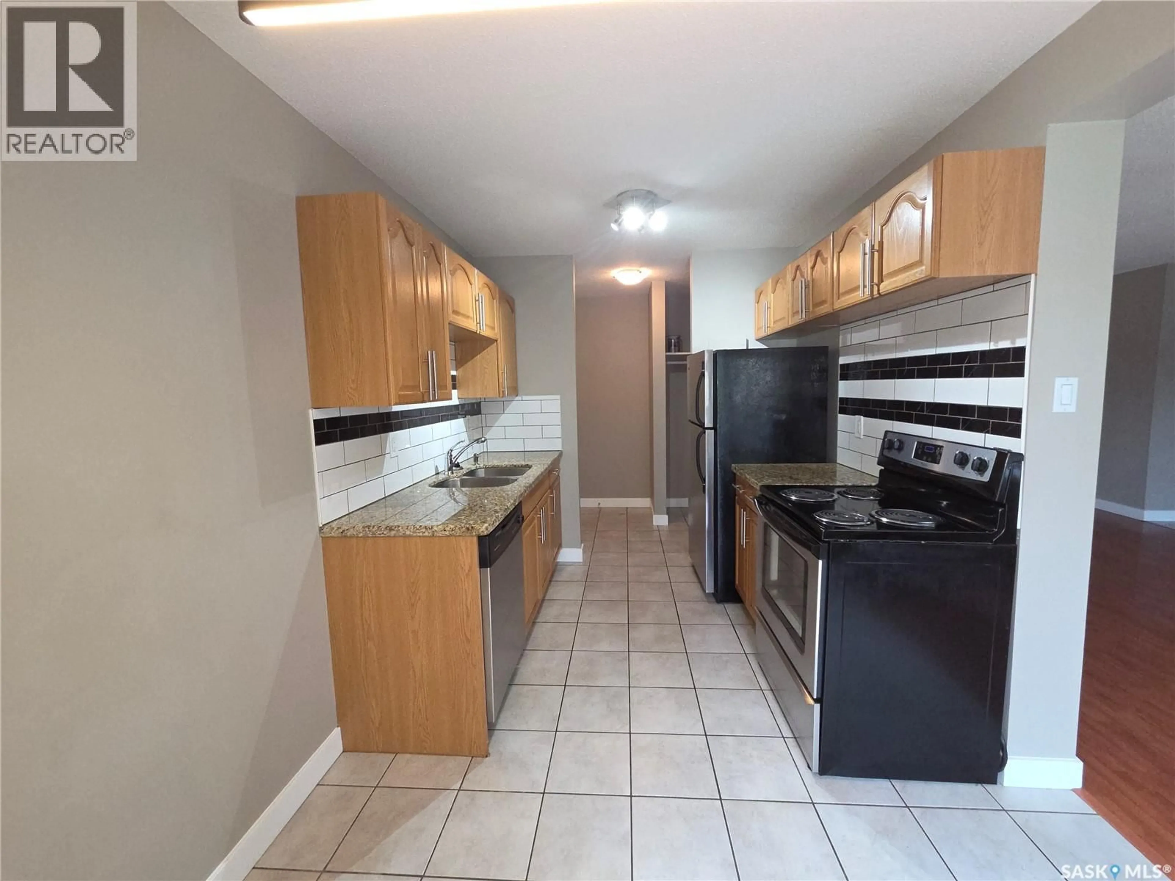 Standard kitchen, ceramic/tile floor for 22 208 LINDSAY PLACE, Saskatoon Saskatchewan S7H3E6