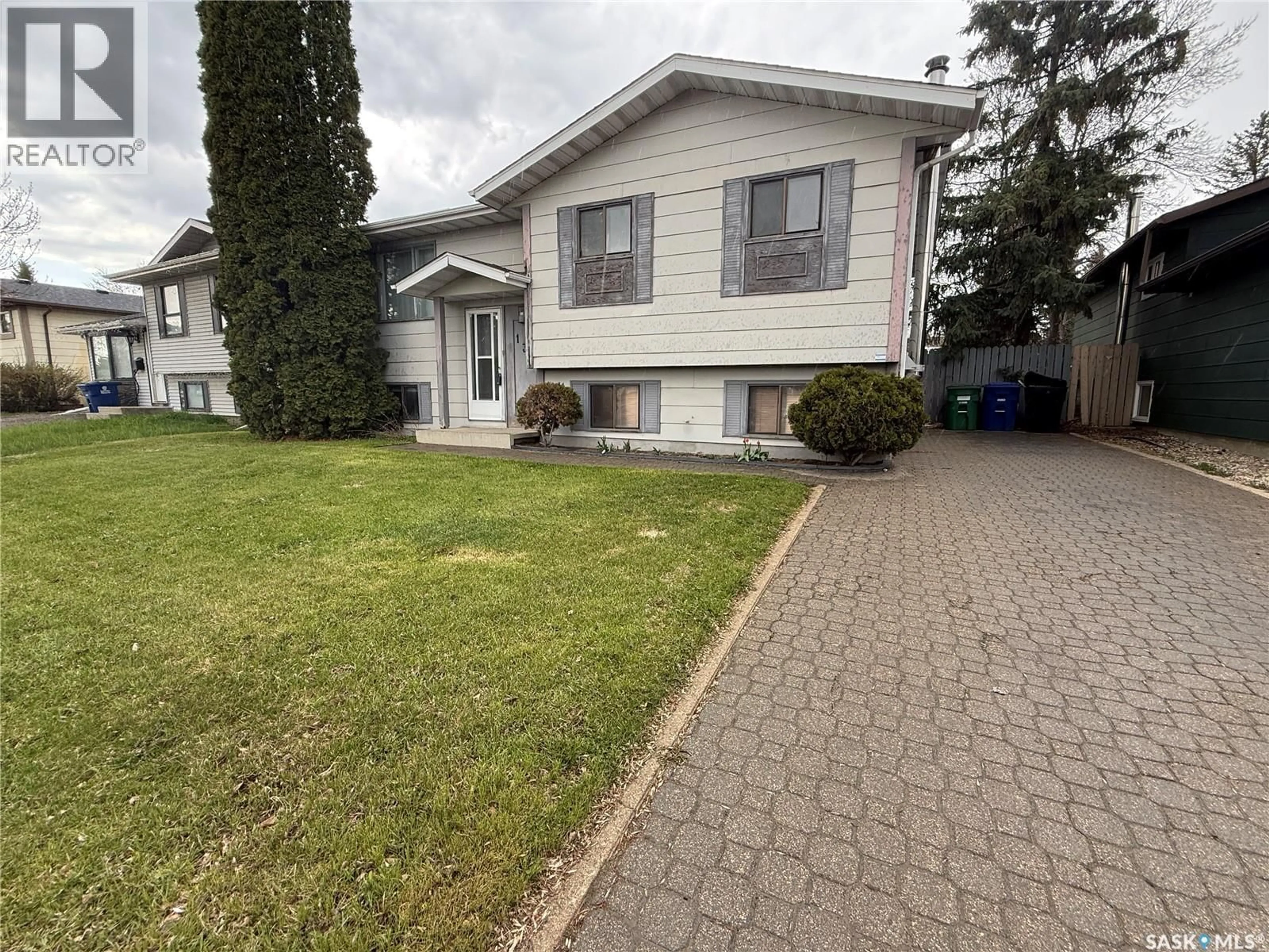 Home with vinyl exterior material, street for 138 WEYAKWIN DRIVE, Saskatoon Saskatchewan S7J4M5