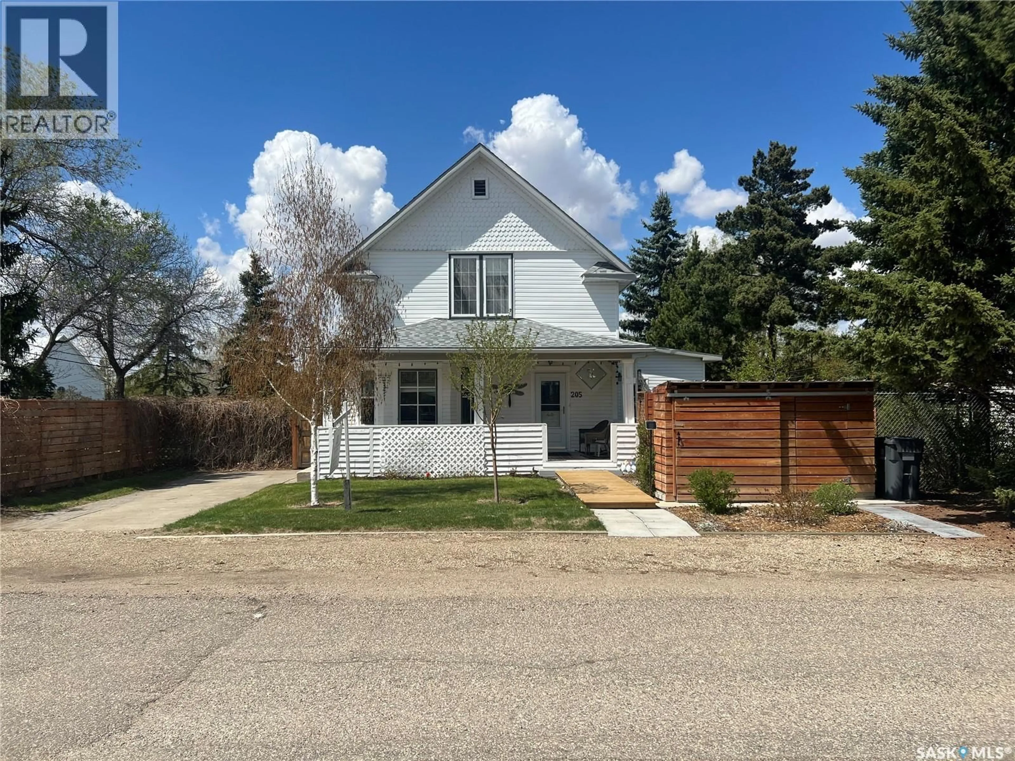 Home with vinyl exterior material, street for 205 3RD AVENUE, Harris Saskatchewan S0L1K0