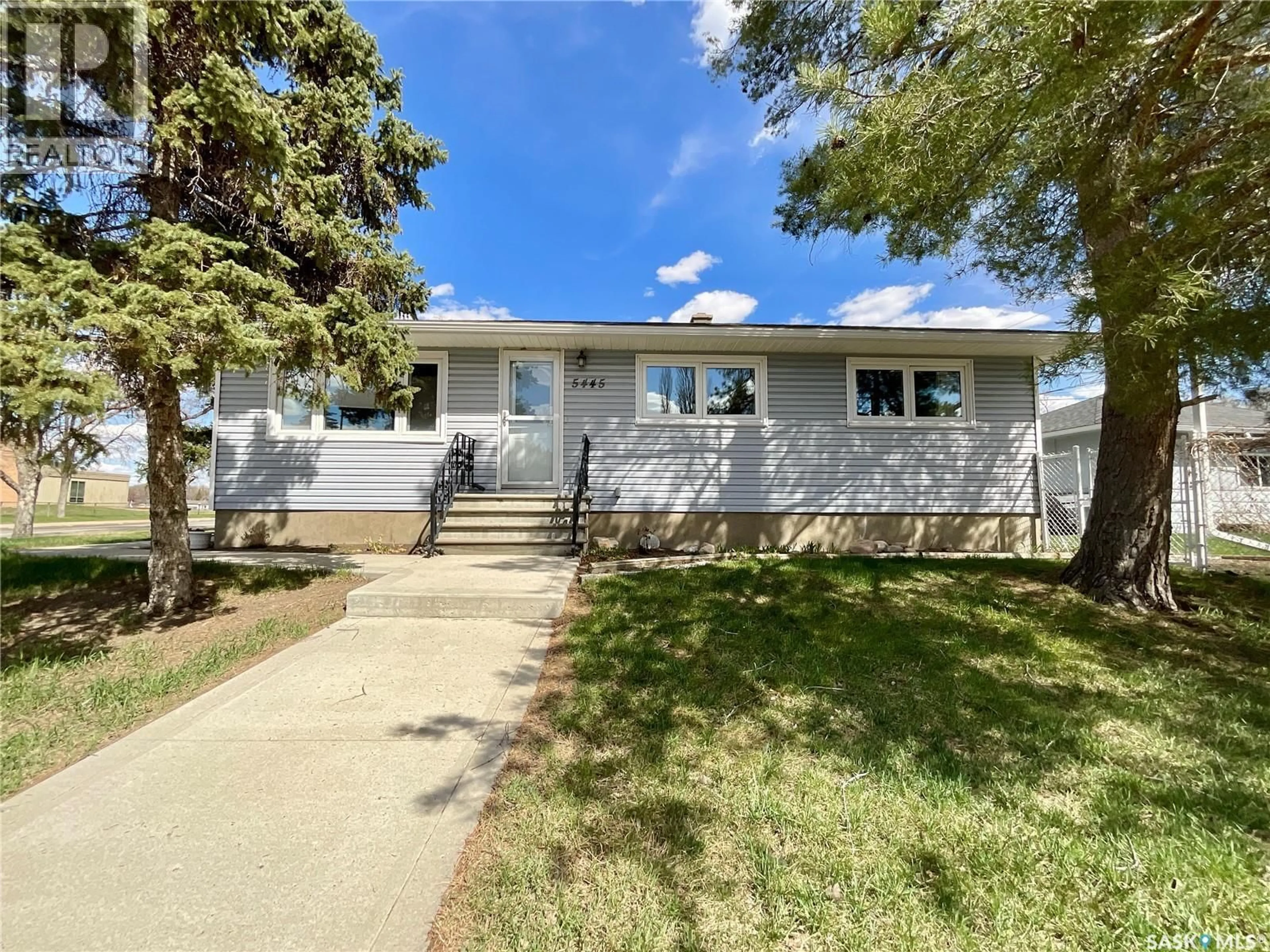 Home with vinyl exterior material, street for 5445 4TH AVENUE, Regina Saskatchewan S4T0J8
