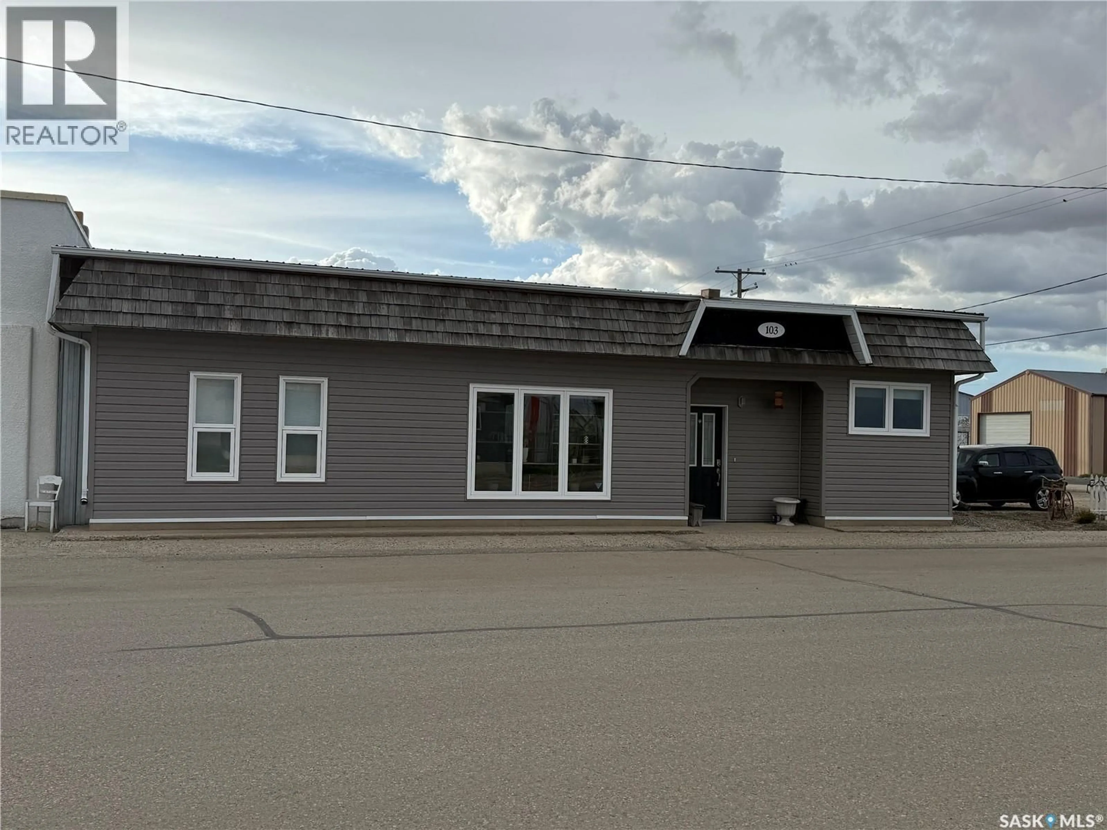 A pic from outside/outdoor area/front of a property/back of a property/a pic from drone, building for 103 SOURIS STREET, Yellow Grass Saskatchewan S0G5J0