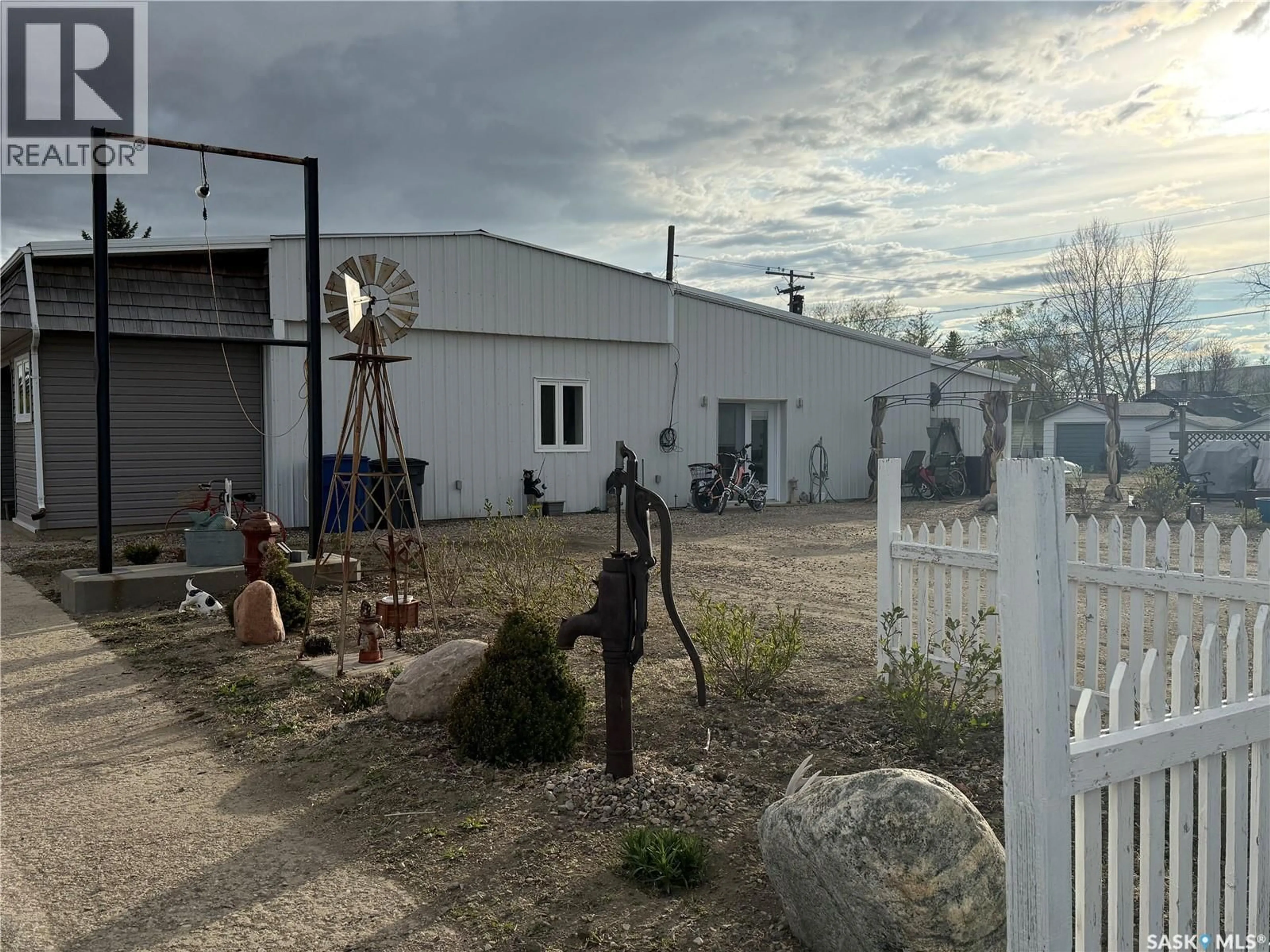 A pic from outside/outdoor area/front of a property/back of a property/a pic from drone, building for 103 SOURIS STREET, Yellow Grass Saskatchewan S0G5J0
