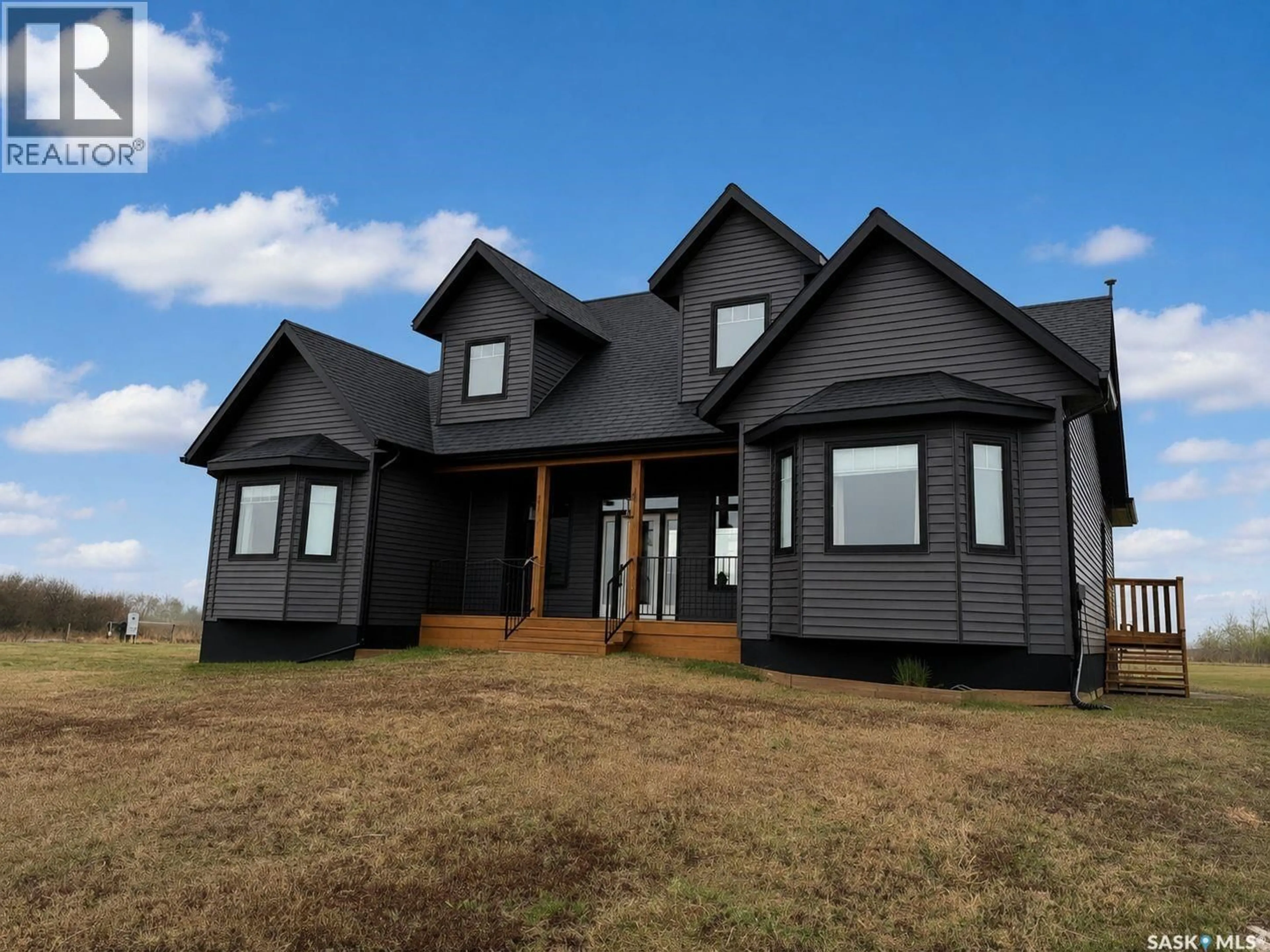 Home with vinyl exterior material, building for WIWCHAR ACREAGE, Vanscoy Rm No. 345 Saskatchewan S0L2L0