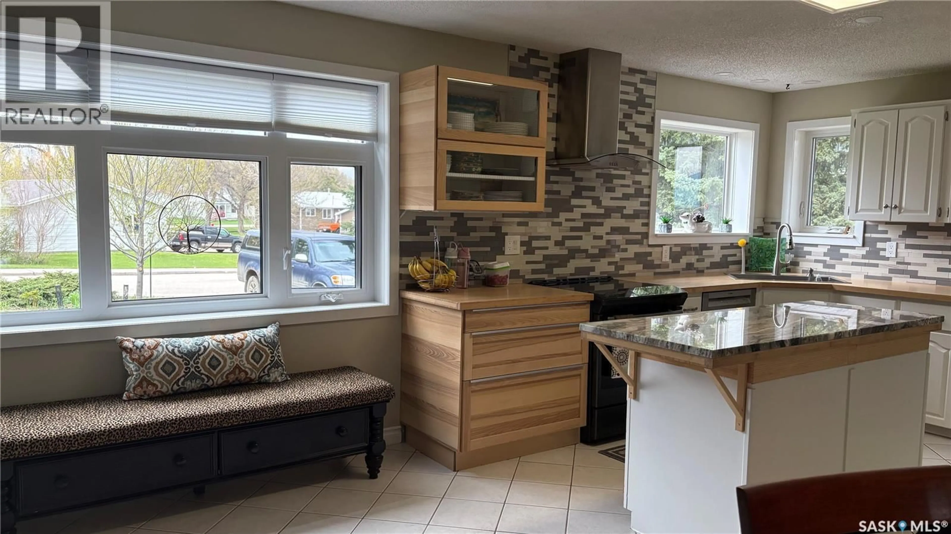 Open concept kitchen, ceramic/tile floor for 303 CURRIE CRESCENT, Strasbourg Saskatchewan S0G4V0