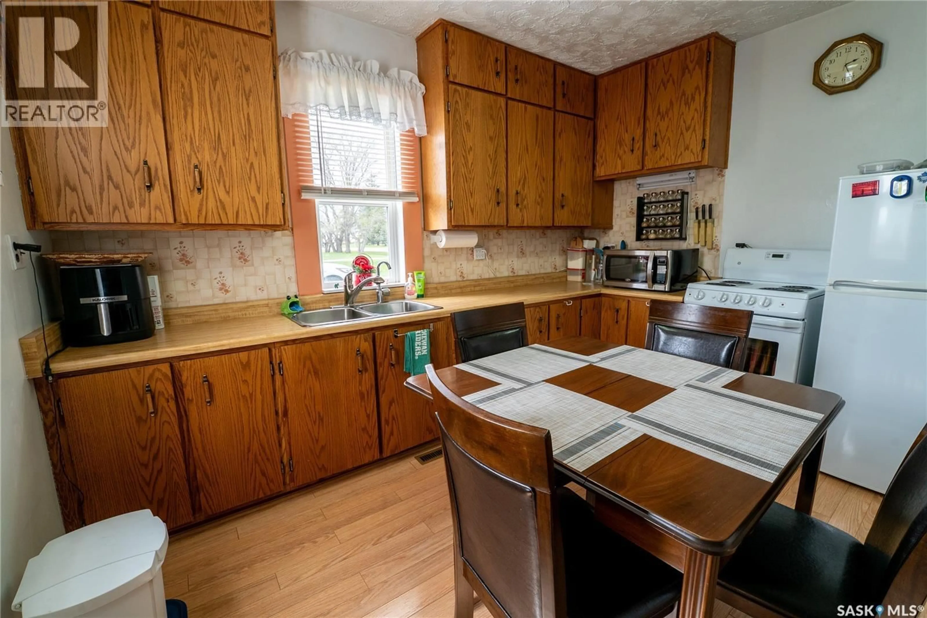 Standard kitchen, wood/laminate floor for 300 CARSON STREET, Dundurn Saskatchewan S0K1K0