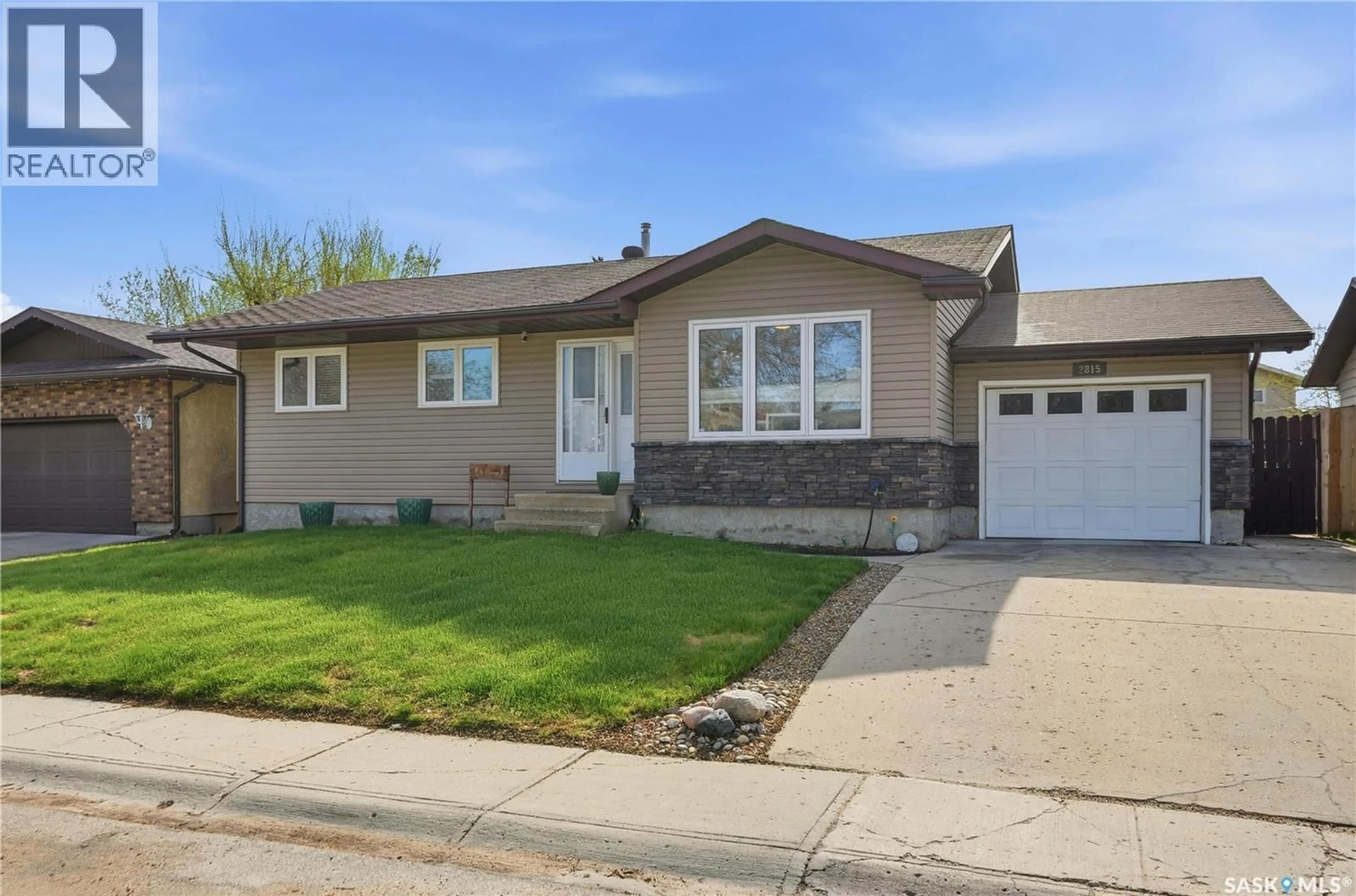 Home with vinyl exterior material, street for 2815 HELMSING STREET, Regina Saskatchewan S4V0W7