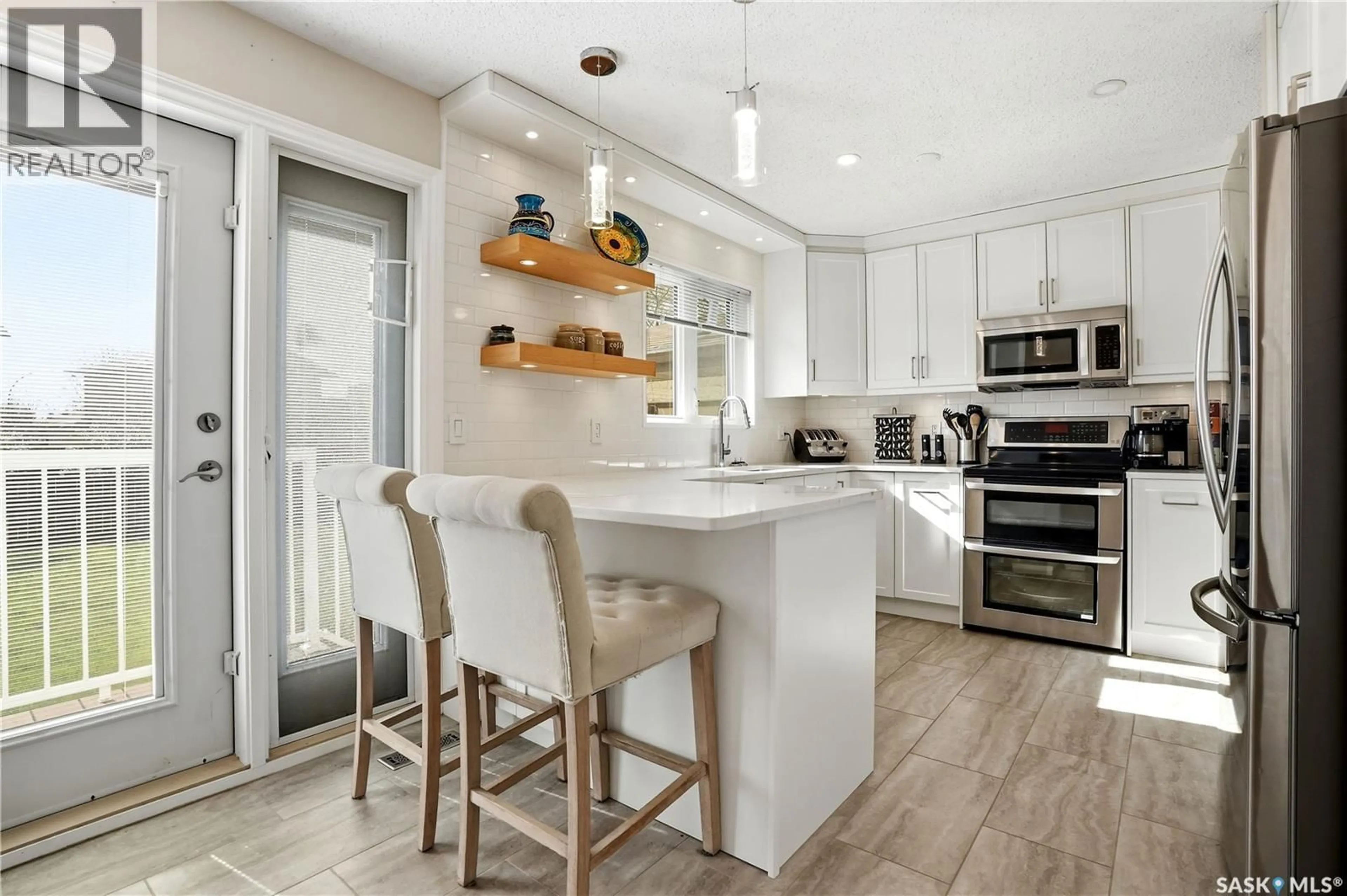 Open concept kitchen, unknown for 2815 HELMSING STREET, Regina Saskatchewan S4V0W7