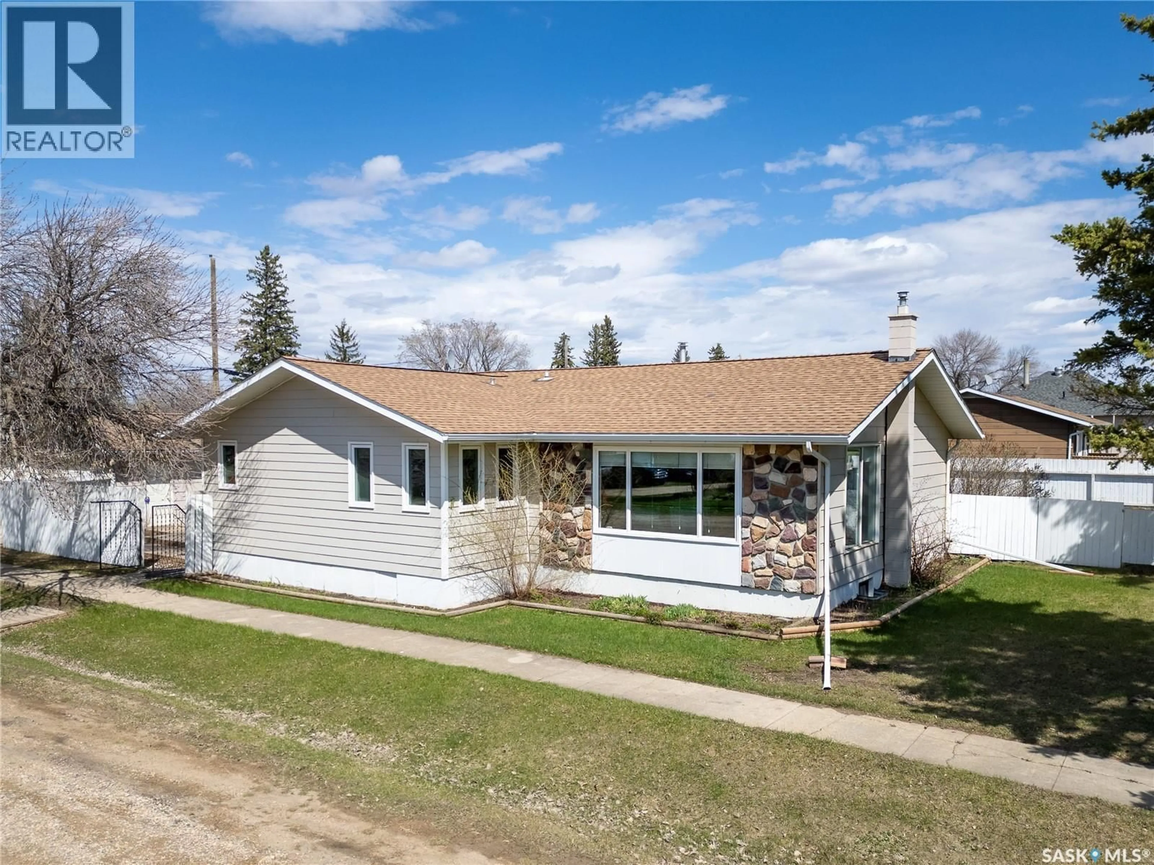 Home with vinyl exterior material, street for 305 STEVENS AVENUE, Birch Hills Saskatchewan S0J0G0