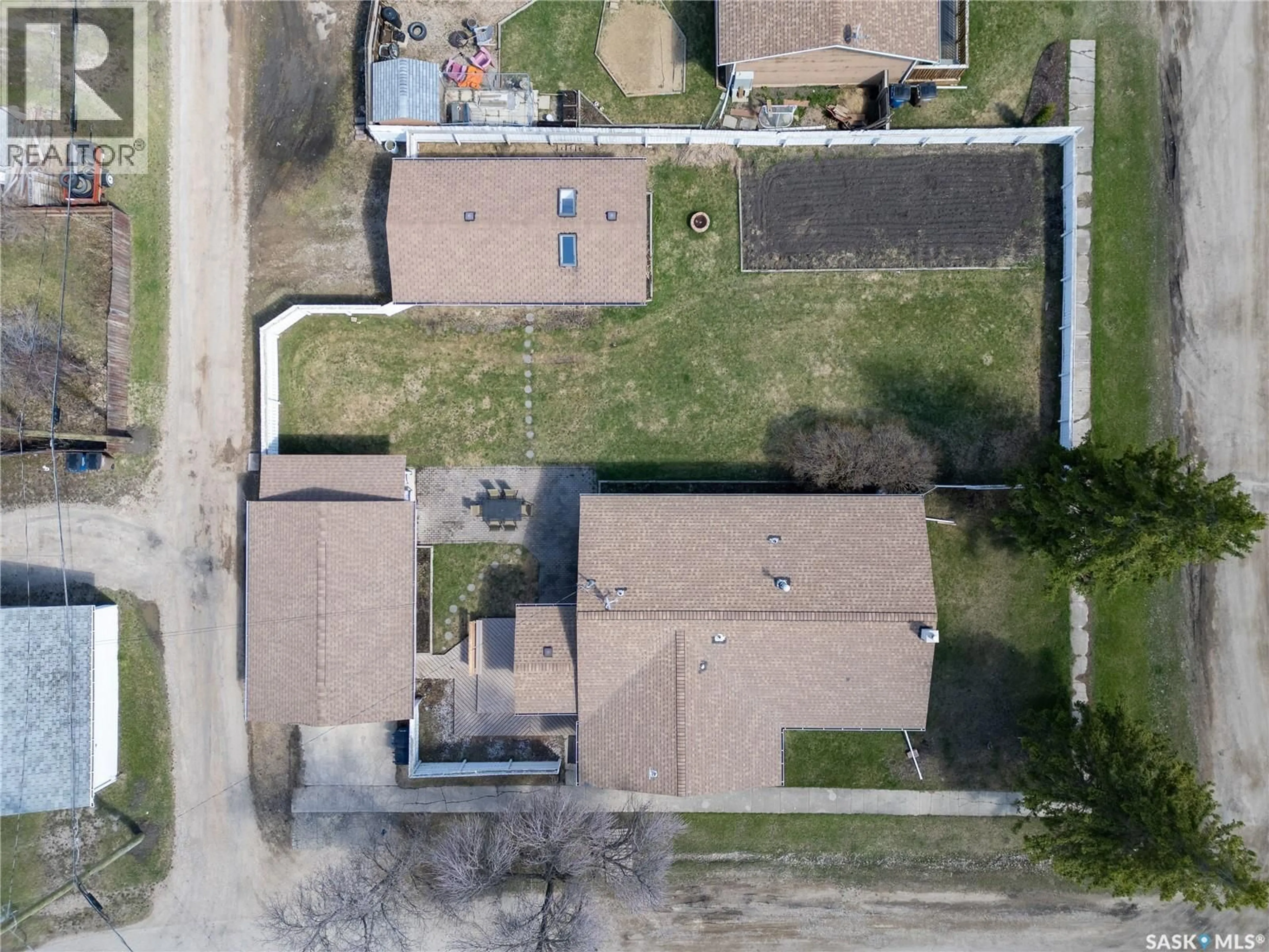 A pic from outside/outdoor area/front of a property/back of a property/a pic from drone, street for 305 STEVENS AVENUE, Birch Hills Saskatchewan S0J0G0