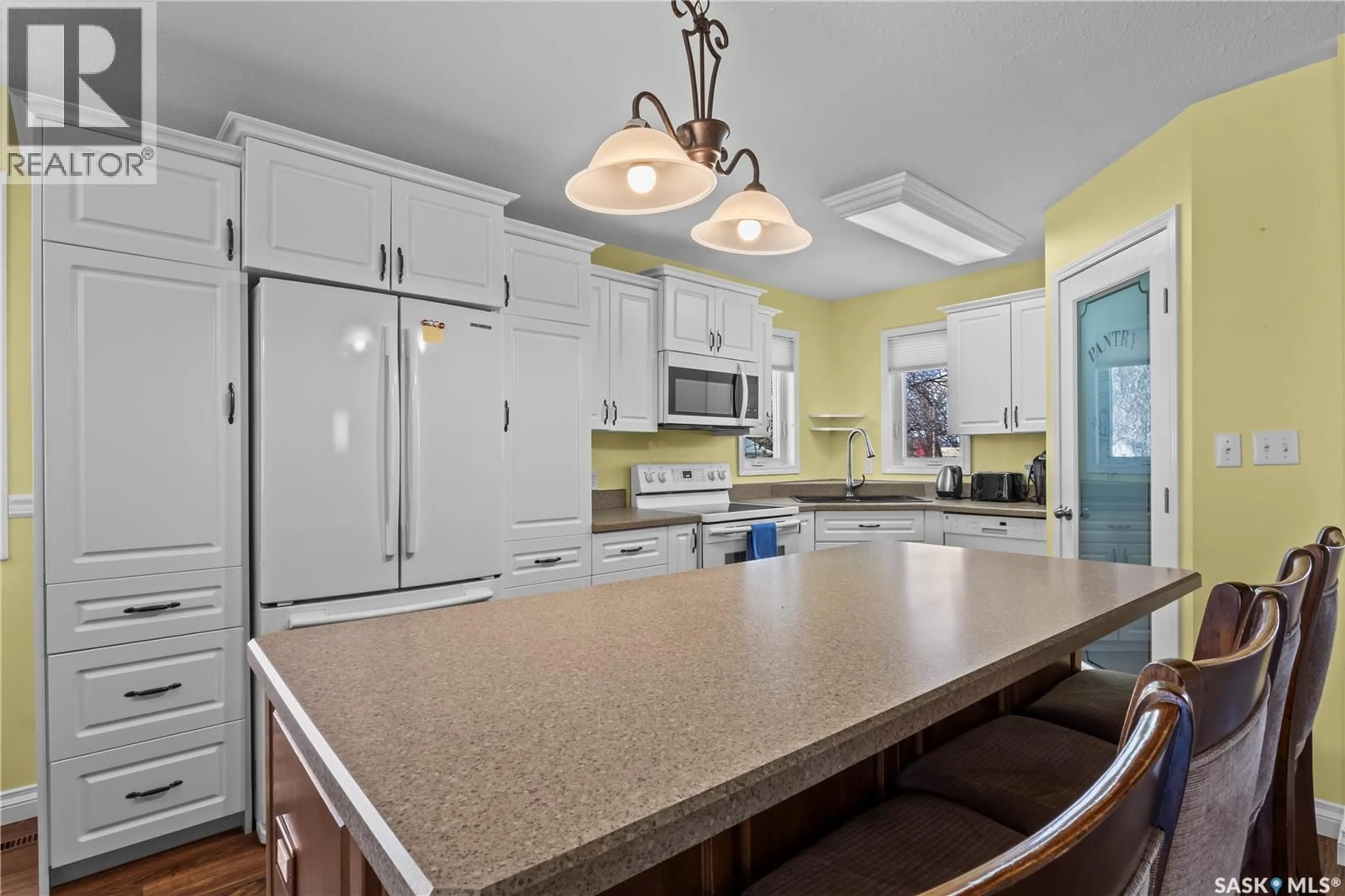 Open concept kitchen, ceramic/tile floor for 305 STEVENS AVENUE, Birch Hills Saskatchewan S0J0G0