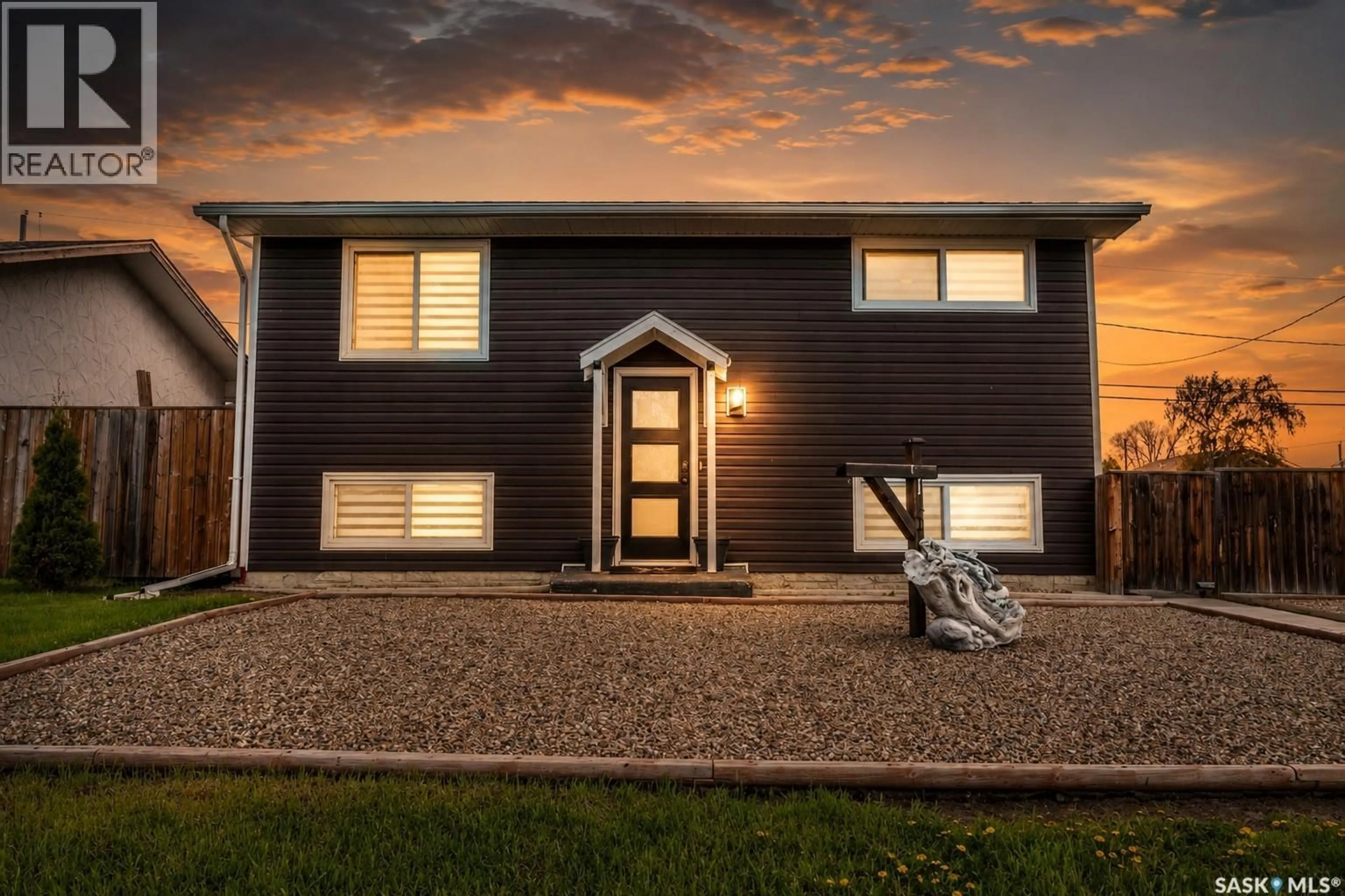 Home with brick exterior material, street for 1304 ATHABASCA STREET, Moose Jaw Saskatchewan S6H6C1