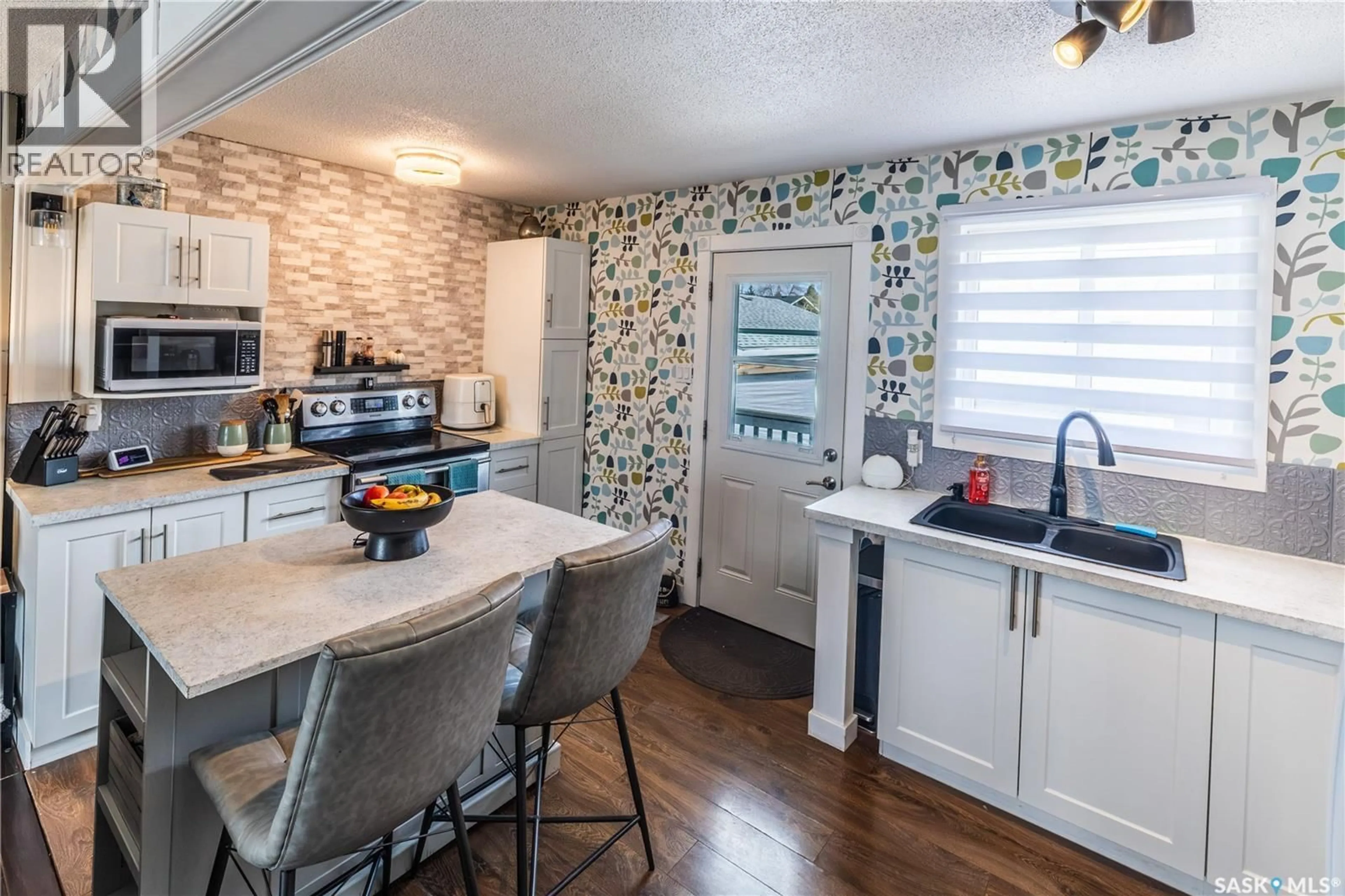 Open concept kitchen, ceramic/tile floor for 1304 ATHABASCA STREET, Moose Jaw Saskatchewan S6H6C1