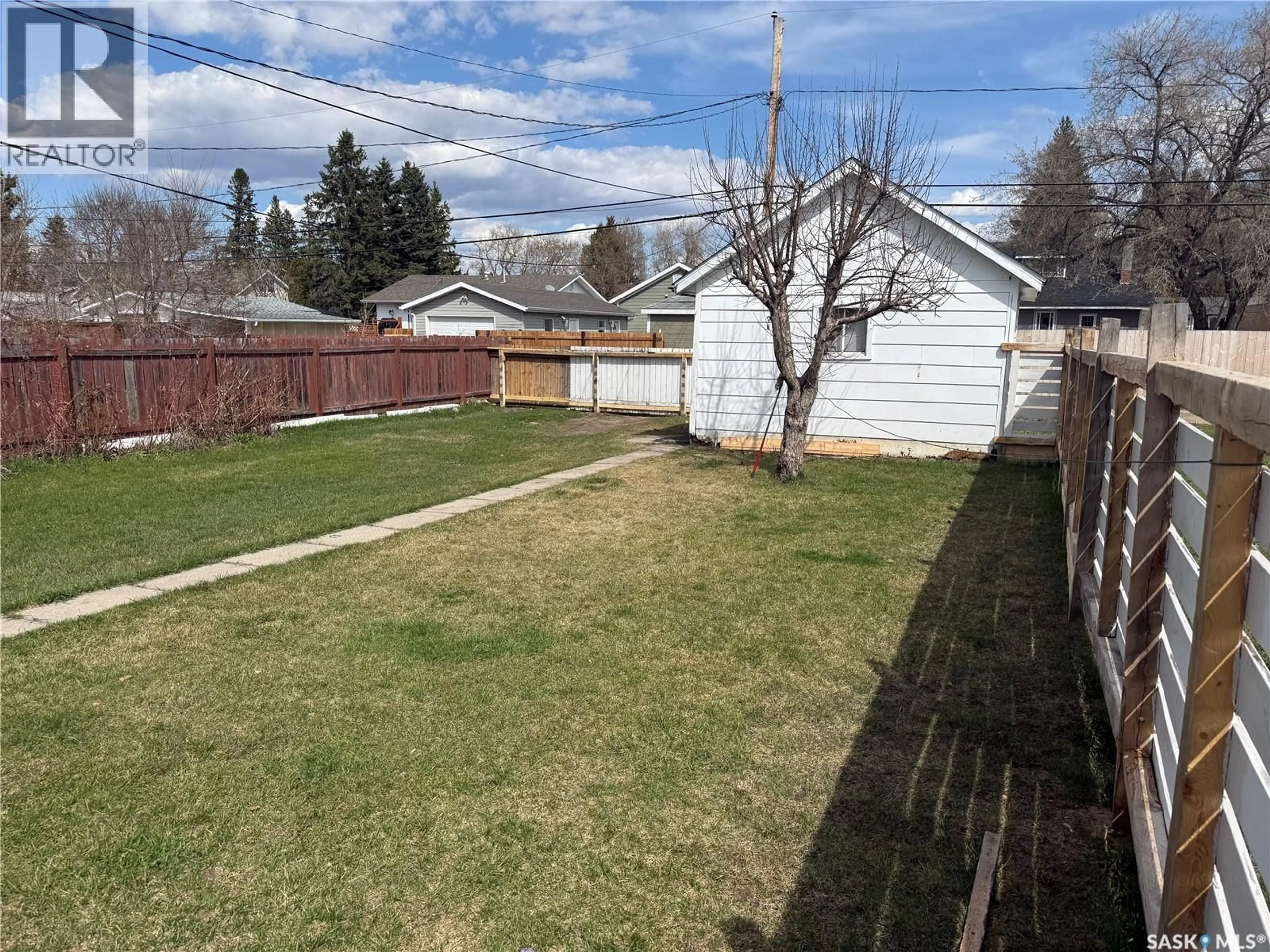A pic from outside/outdoor area/front of a property/back of a property/a pic from drone, street for 901 2ND STREET, Nipawin Saskatchewan S0E1E0
