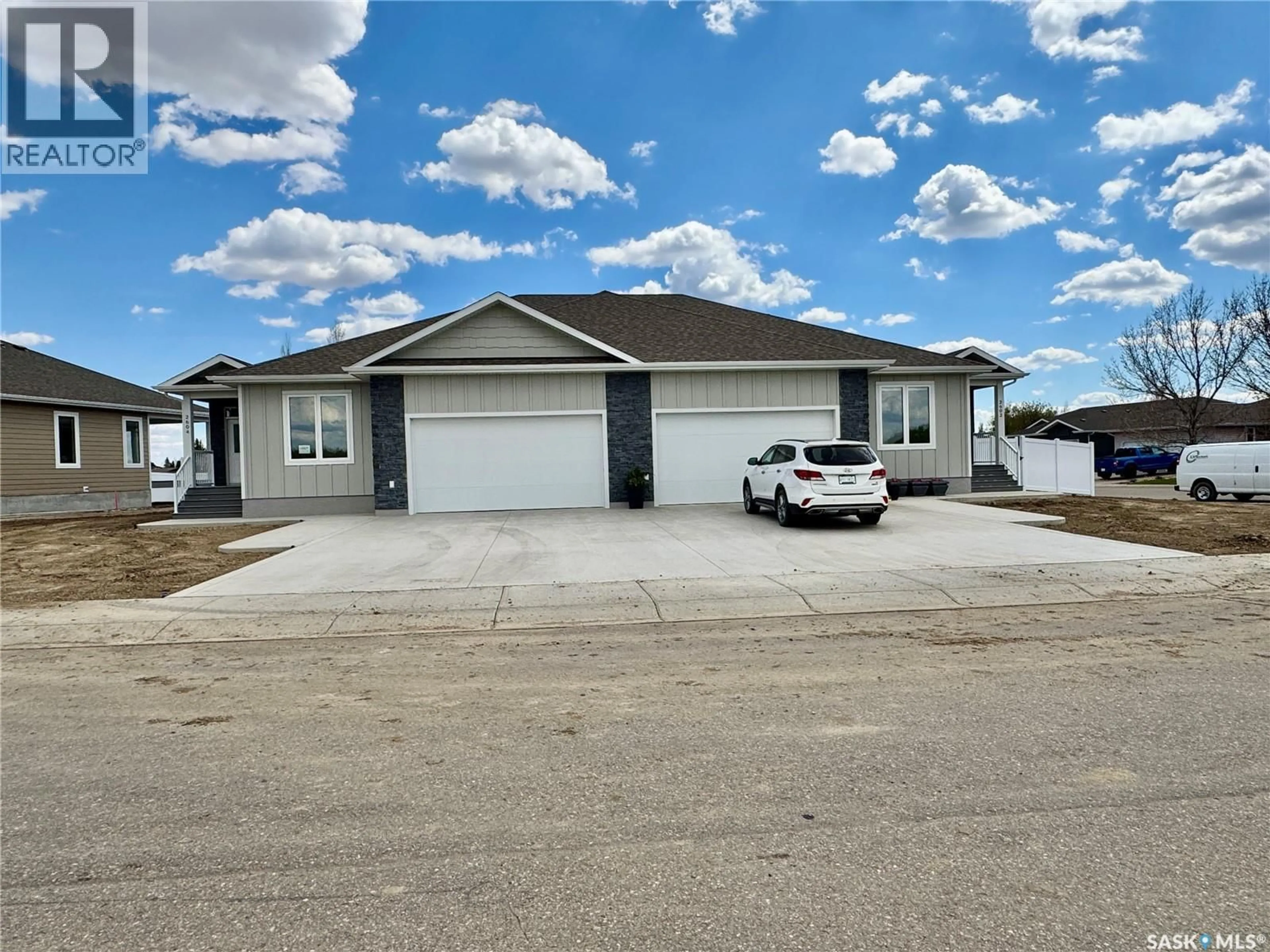 Home with vinyl exterior material, street for 2604 SANDPIPER ROAD, North Battleford Saskatchewan S9A3Z3