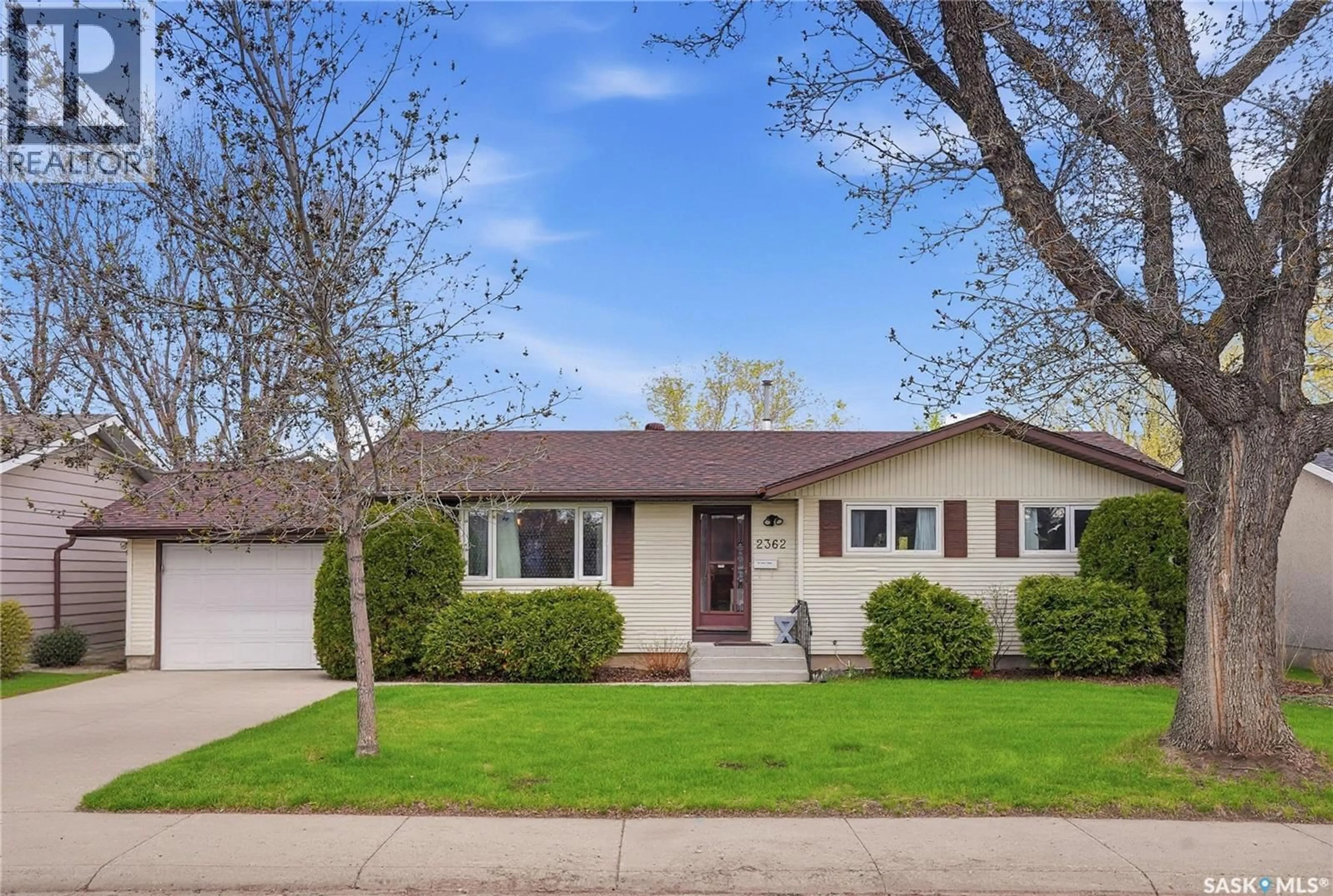 Home with vinyl exterior material, street for 2362 EASTHILL, Saskatoon Saskatchewan S7J3E5