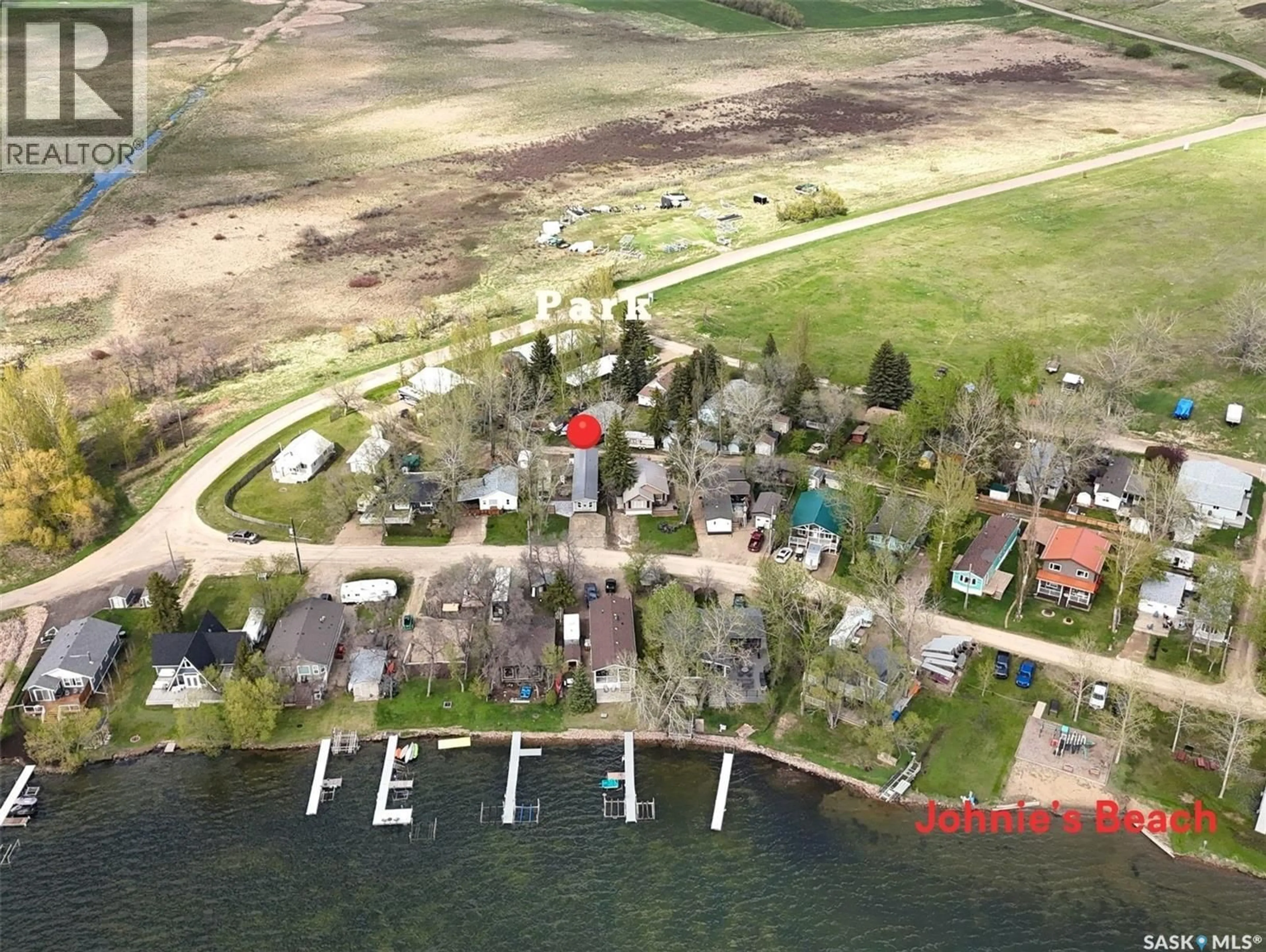 A pic from outside/outdoor area/front of a property/back of a property/a pic from drone, water/lake/river/ocean view for 205 ELIM DRIVE, Lac Pelletier Rm No. 107 Saskatchewan S0N2Y0