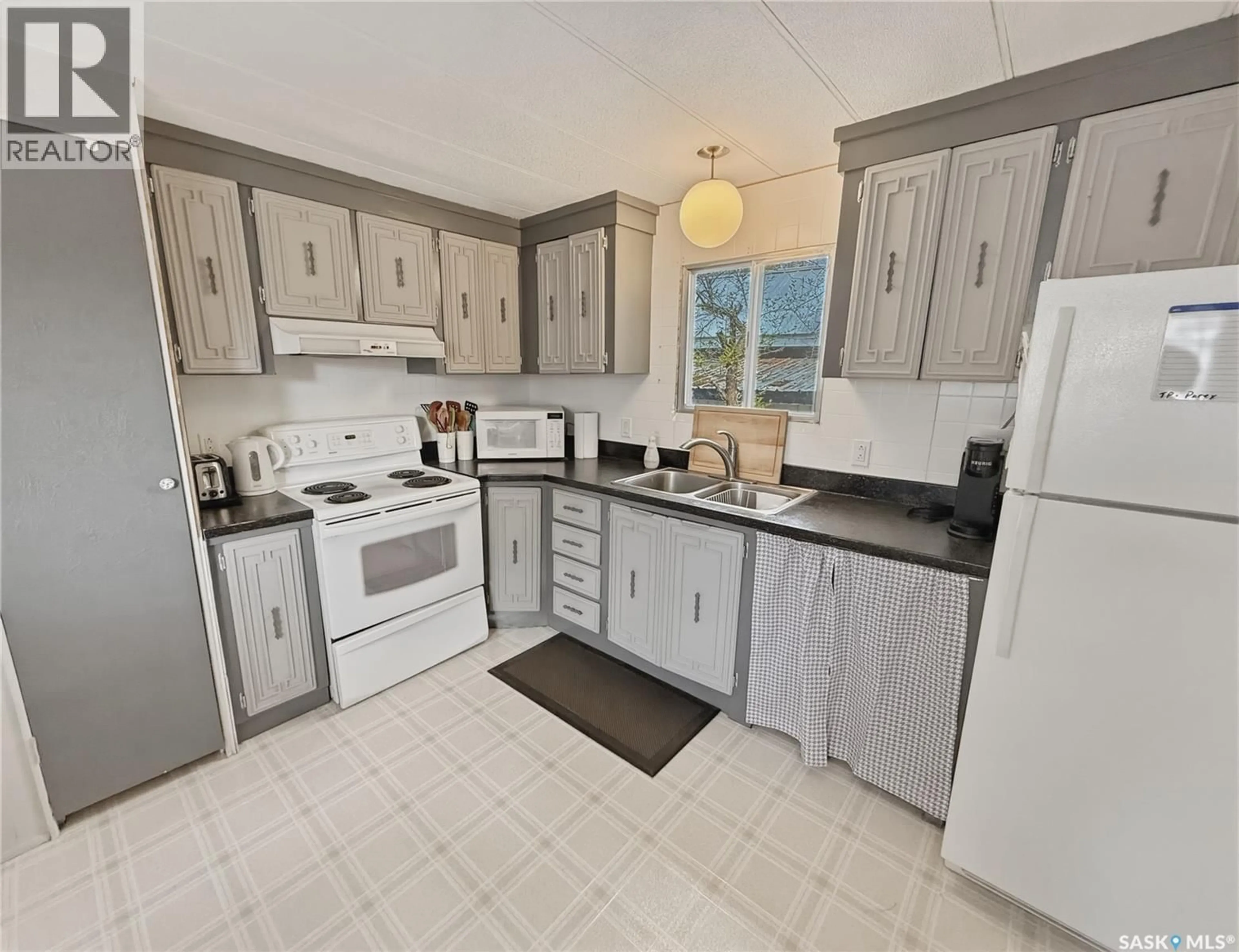 Standard kitchen, ceramic/tile floor for 205 ELIM DRIVE, Lac Pelletier Rm No. 107 Saskatchewan S0N2Y0