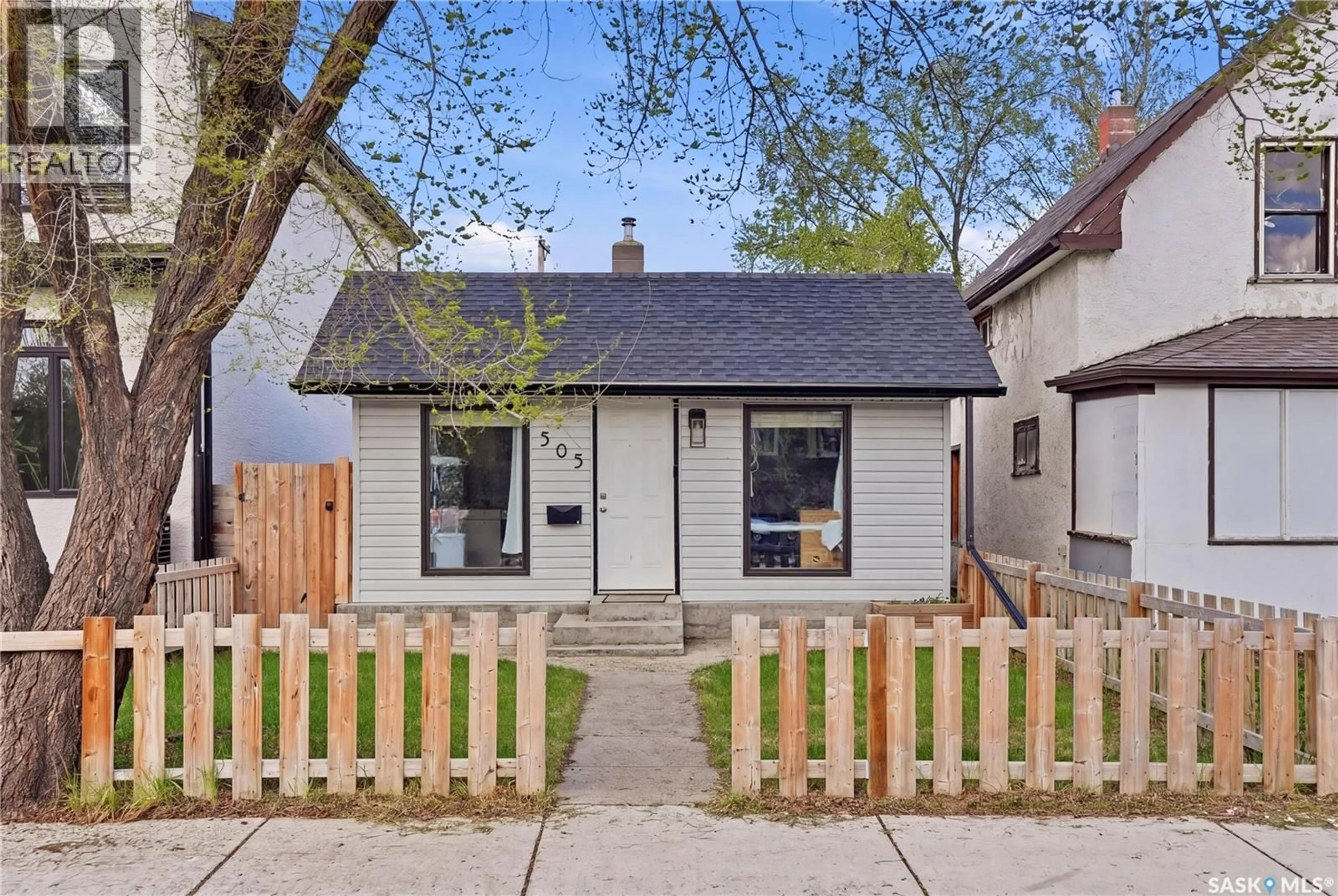 Home with brick exterior material, street for 505 F AVENUE, Saskatoon Saskatchewan S7M1T6