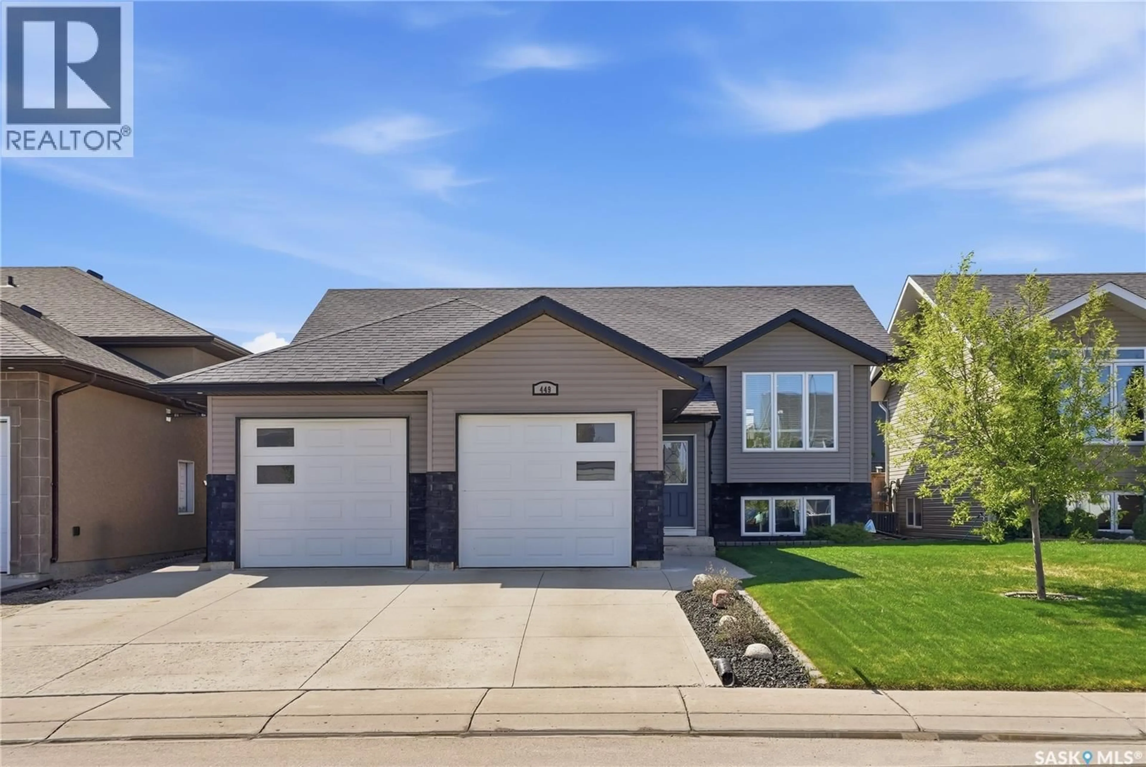 Home with vinyl exterior material, street for 449 SNEAD CRESCENT, Warman Saskatchewan S0K4S1