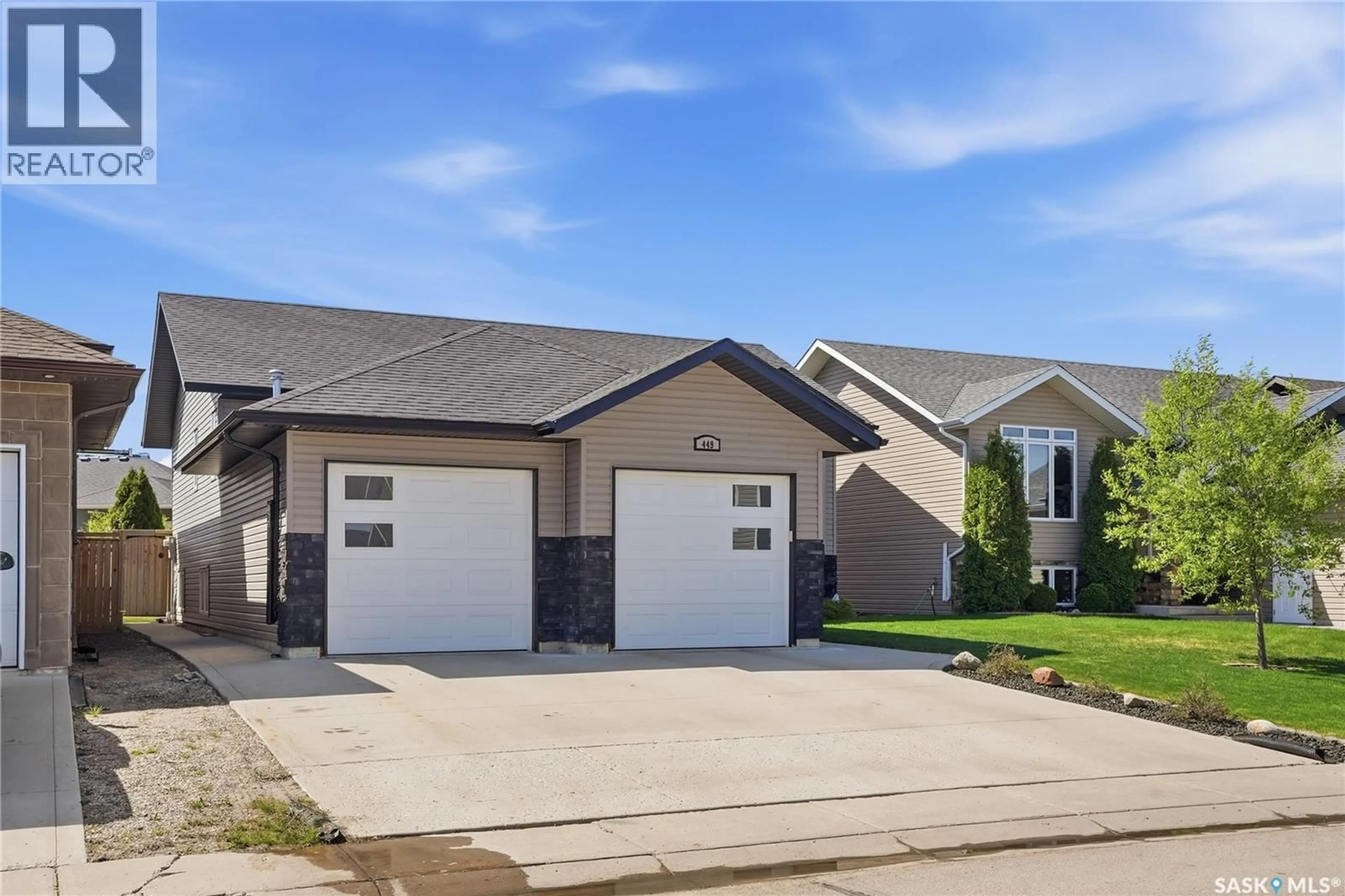 Home with vinyl exterior material, street for 449 SNEAD CRESCENT, Warman Saskatchewan S0K4S1