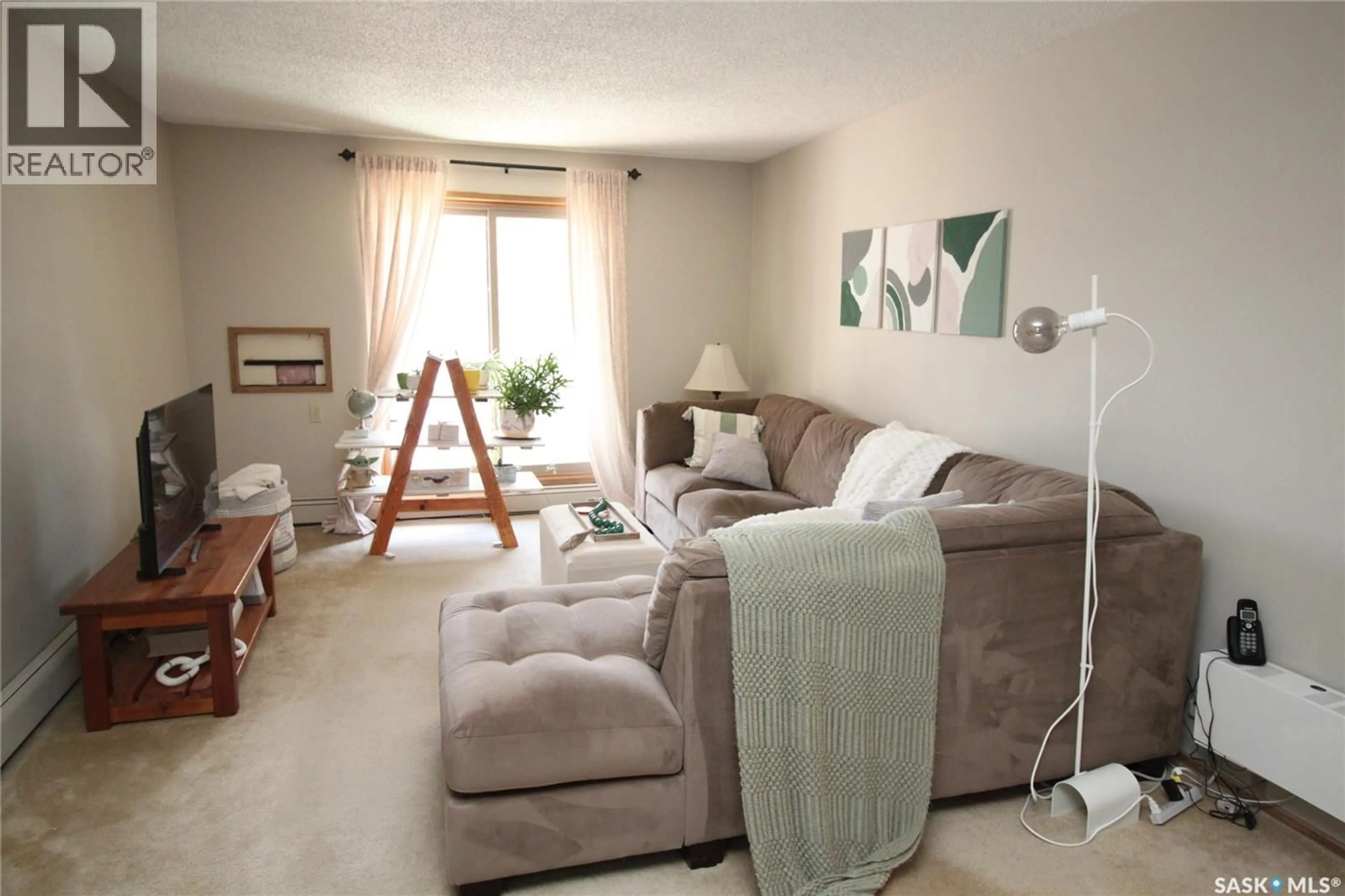 Living room with furniture, unknown for 203 - 1008 TEMPERANCE STREET, Saskatoon Saskatchewan S7N0N6